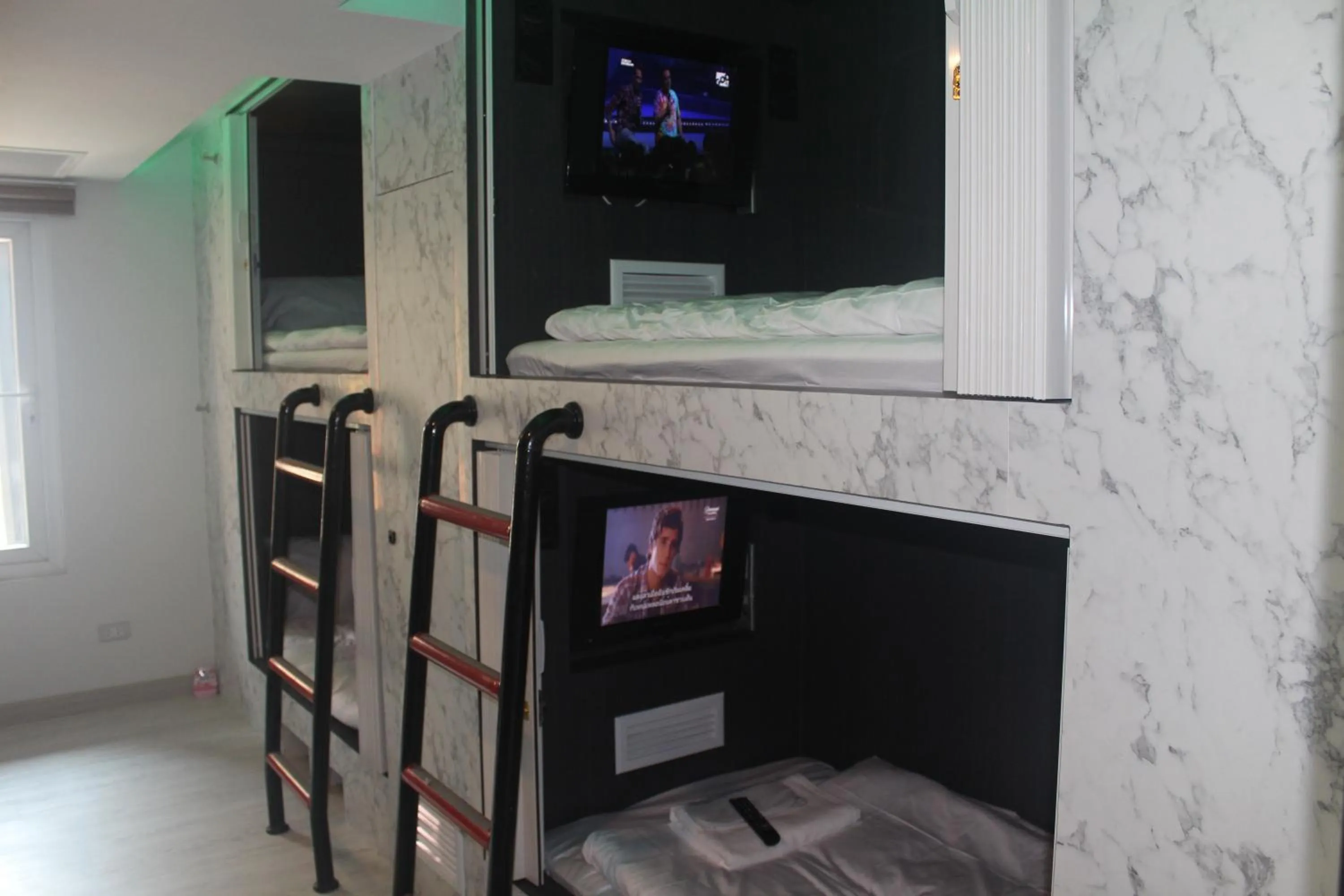 TV and multimedia in H-District Boutique Poshotel