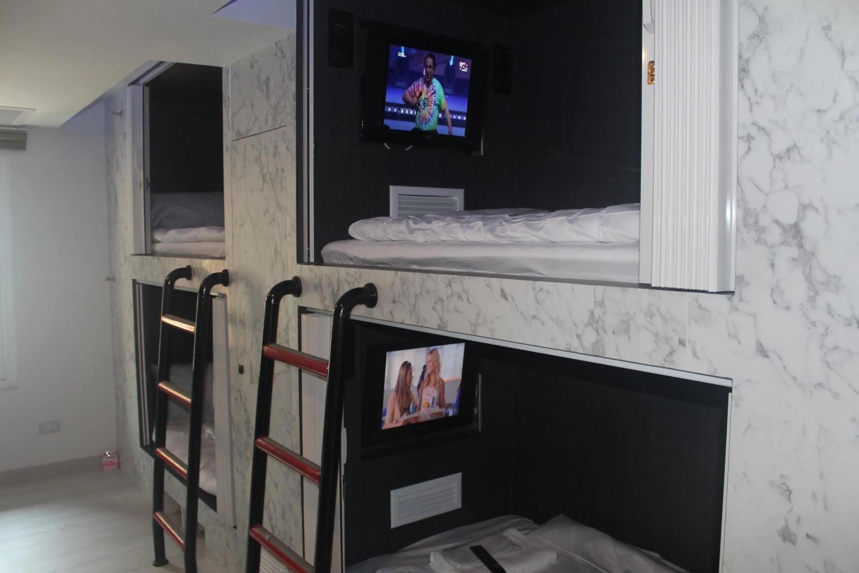 TV and multimedia in H-District Boutique Poshotel