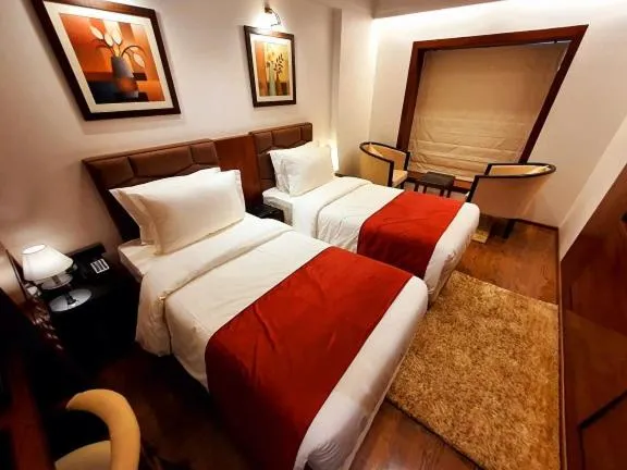 Bed in Hotel MBC Citadel Nashik