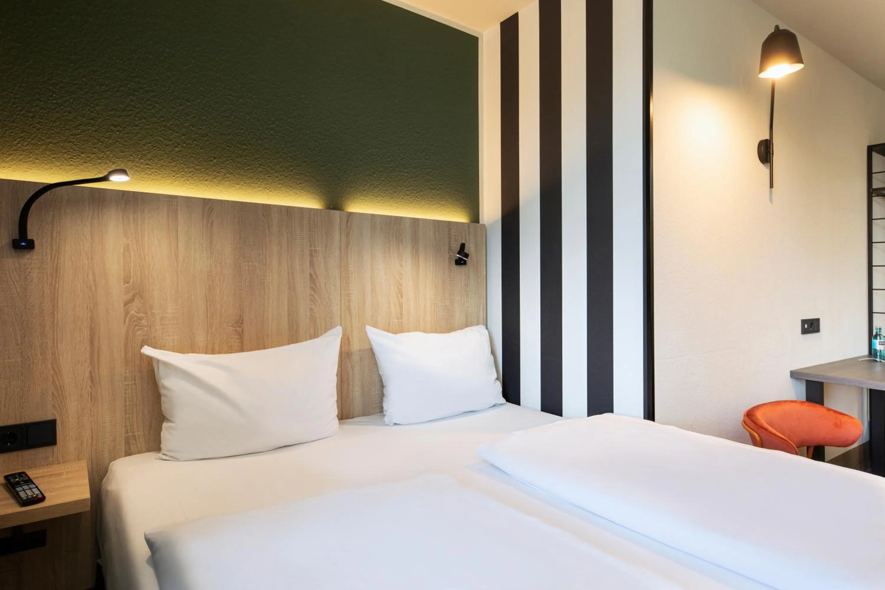 Photo of the whole room, Bed in ACHAT Hotel Stuttgart Zuffenhausen