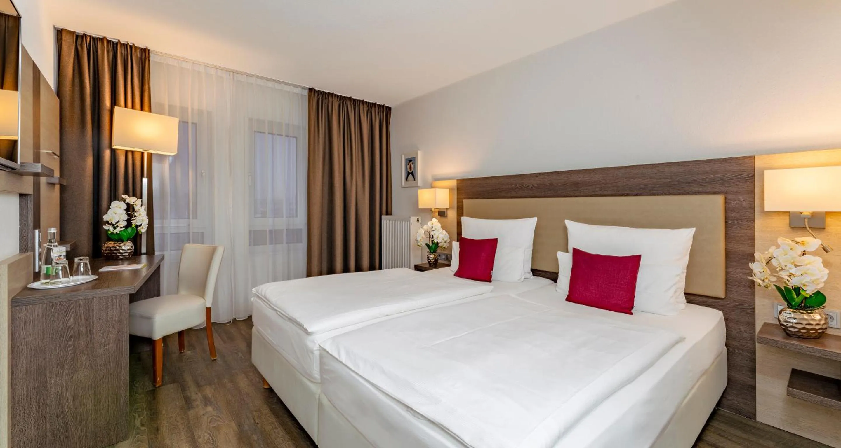 Photo of the whole room, Bed in PLAZA INN Karlsruhe Nord