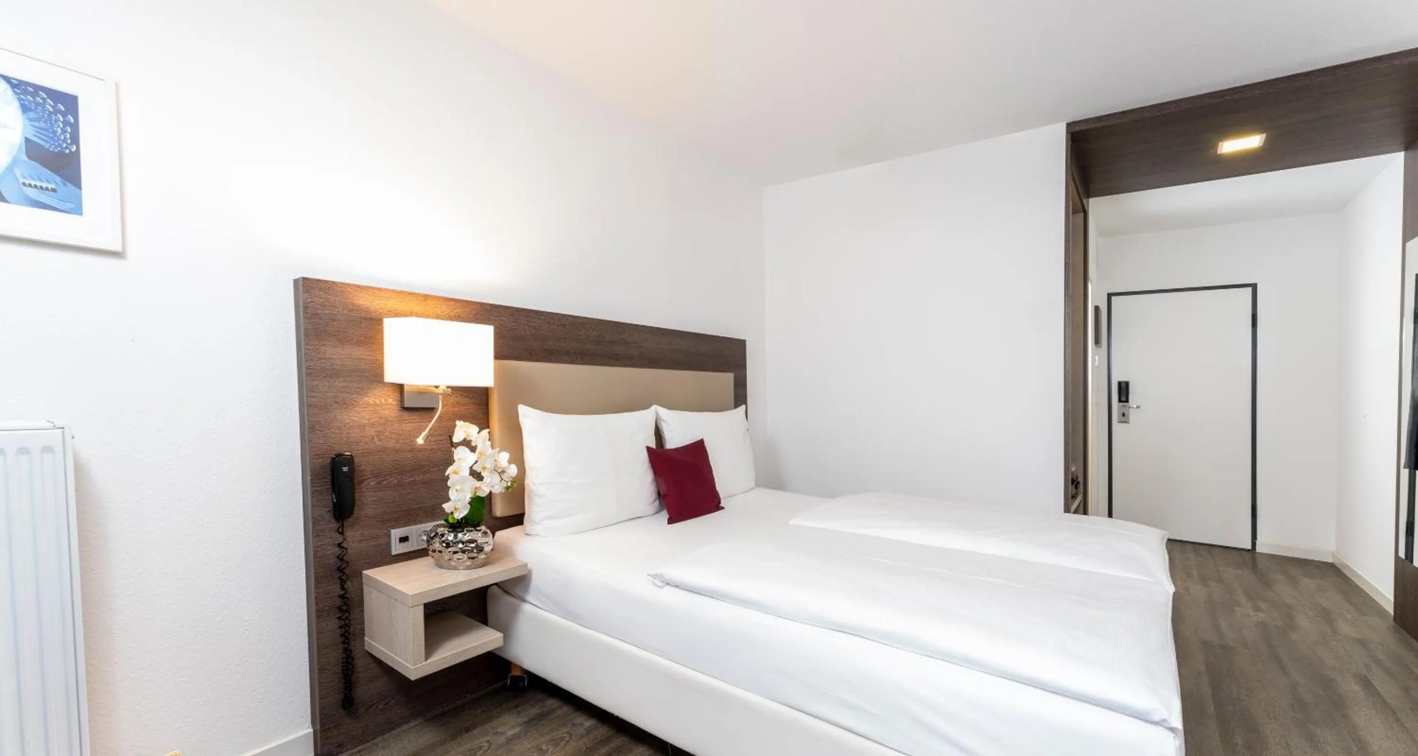 Bedroom, Bed in PLAZA INN Karlsruhe Nord