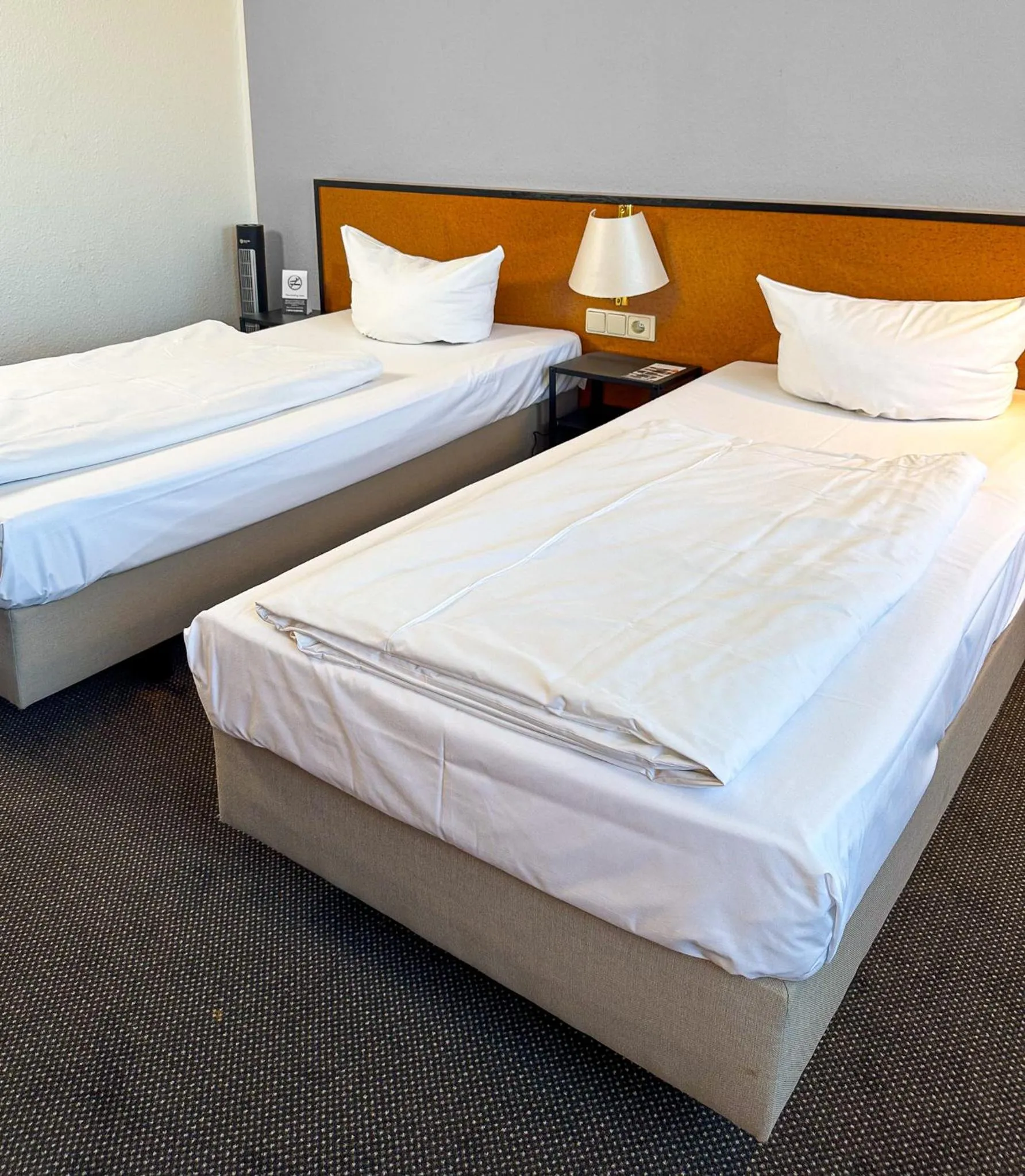 Photo of the whole room, Bed in ACHAT Hotel Frankfurt Airport