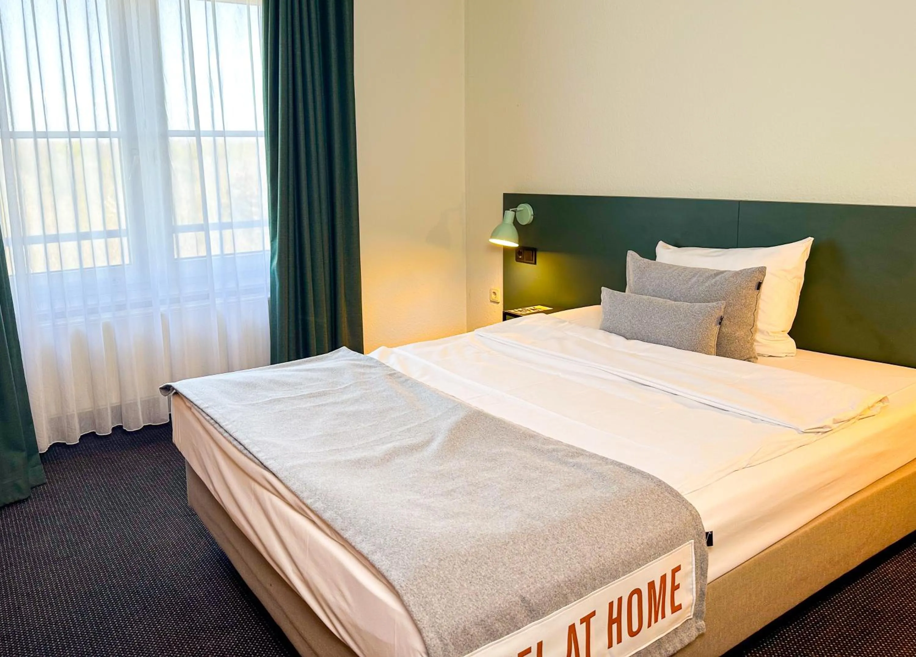 Photo of the whole room, Bed in ACHAT Hotel Frankfurt Airport