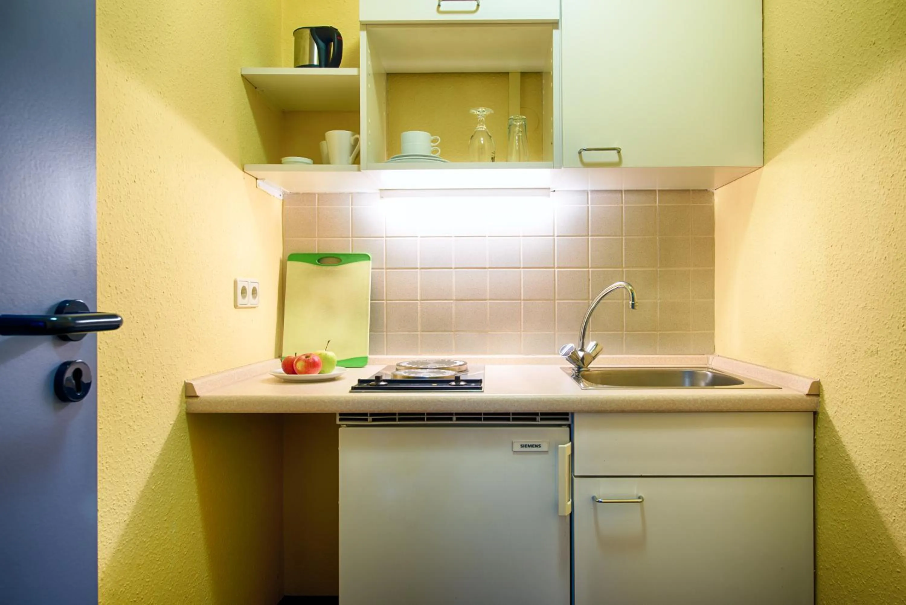 Kitchen or kitchenette in ACHAT Hotel Zwickau