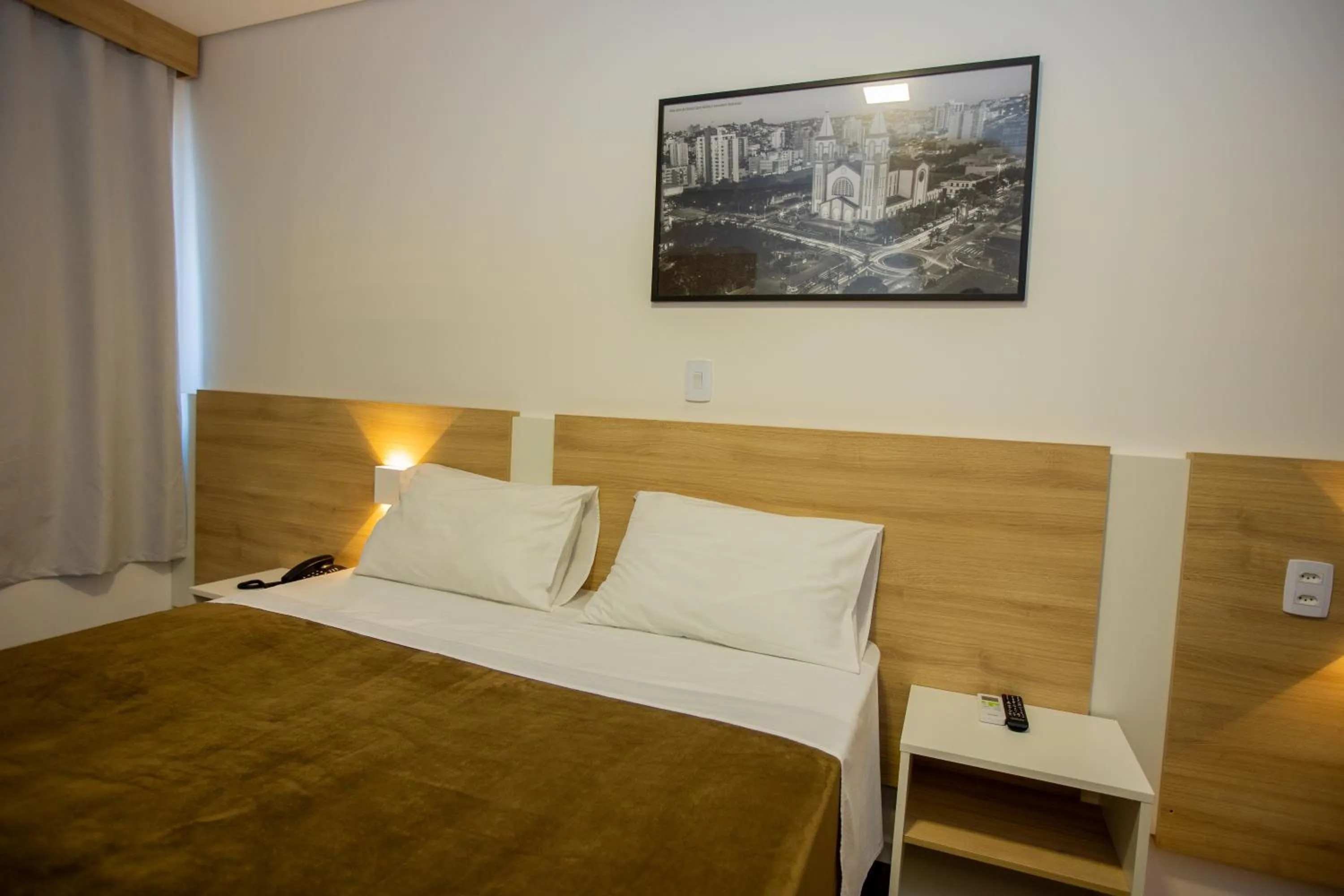 Bed in Tri Hotel Chapecó