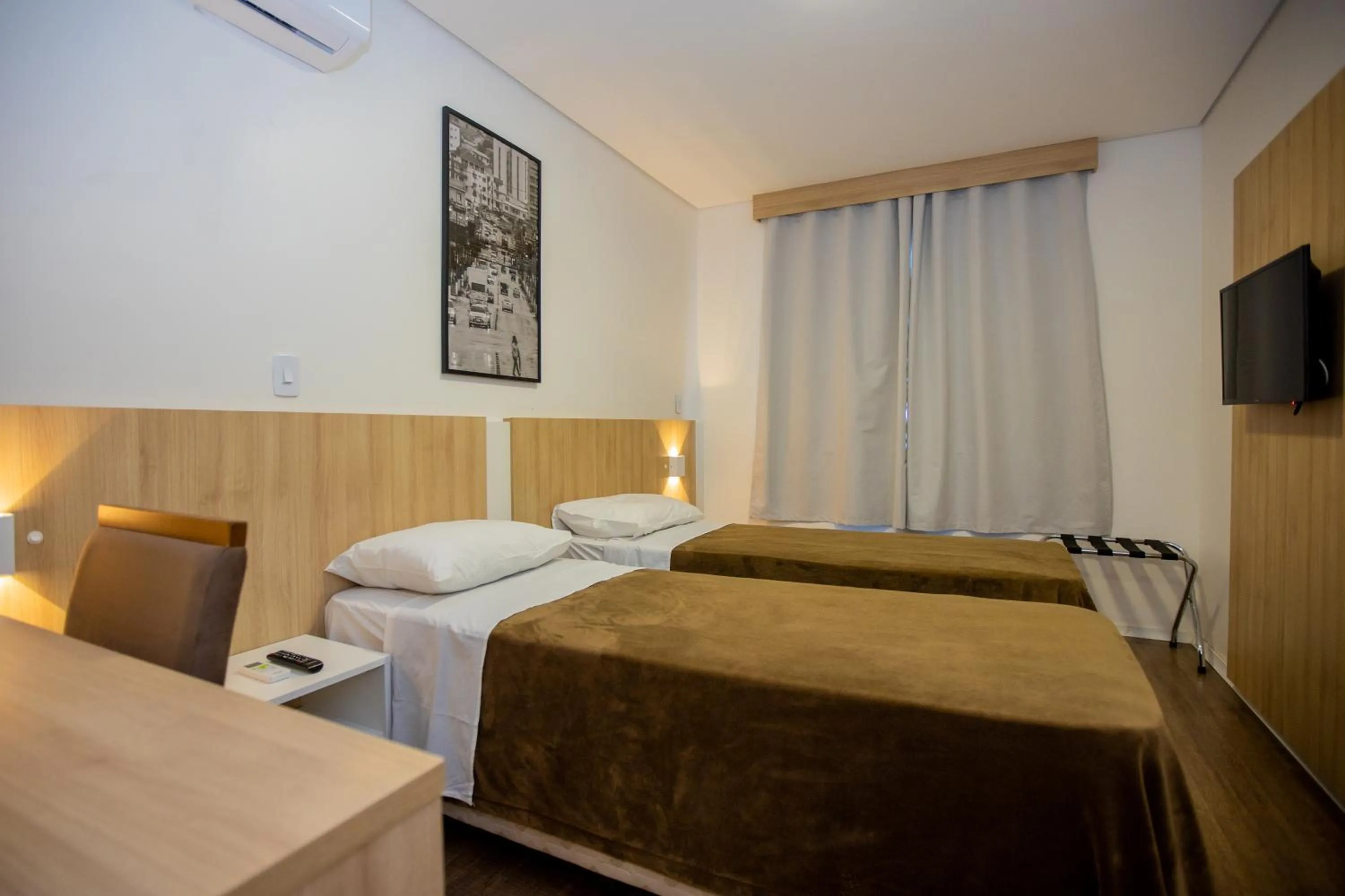 Bed in Tri Hotel Chapecó