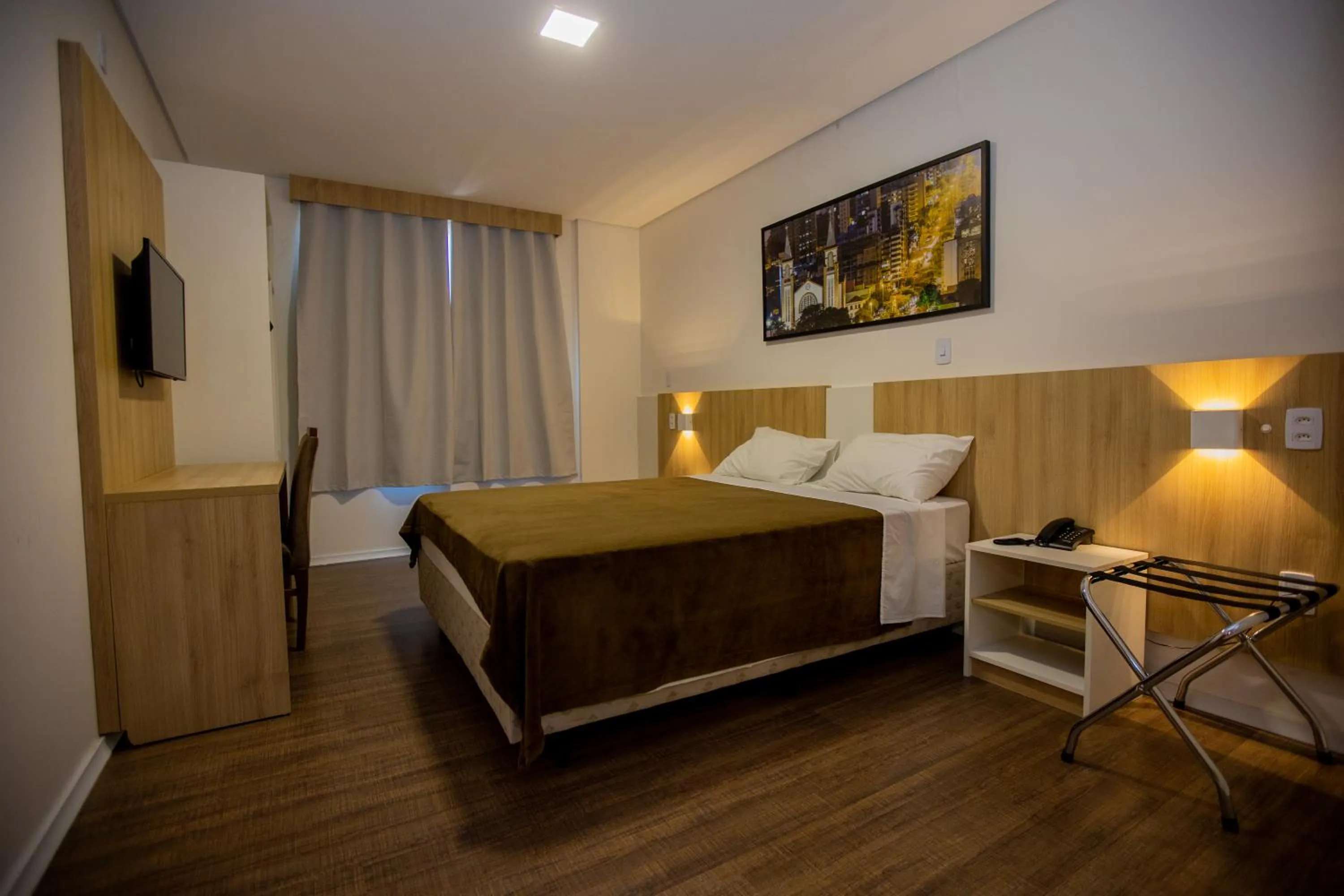 Bed in Tri Hotel Chapecó