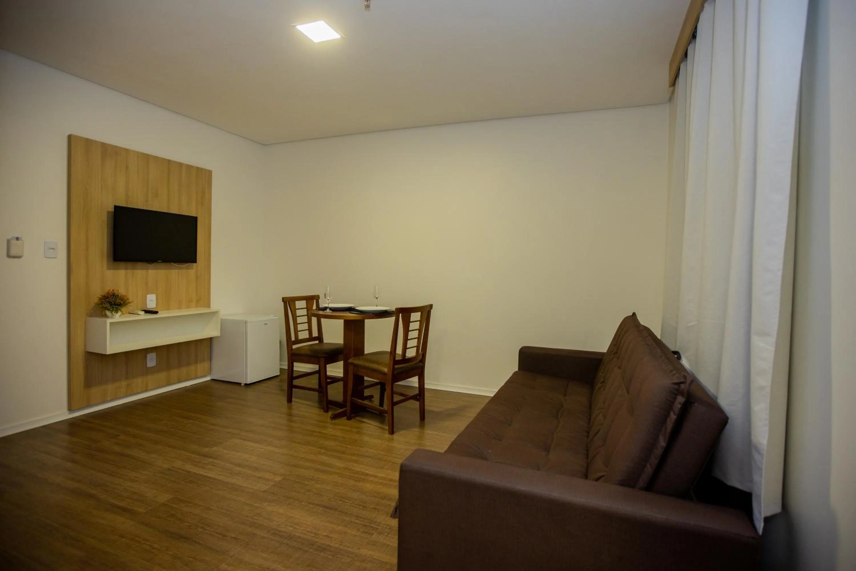 Seating area in Tri Hotel Chapecó