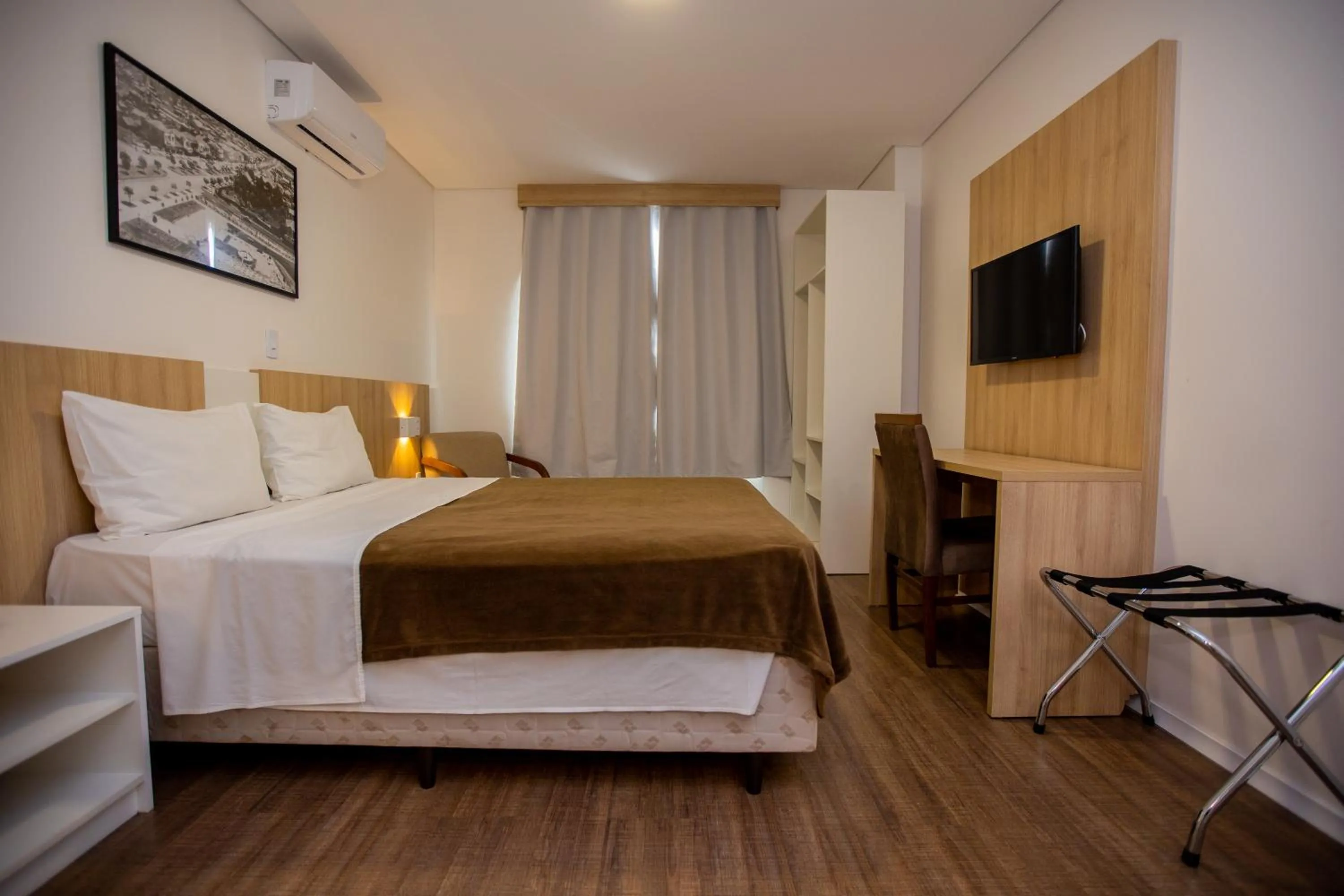 Bed in Tri Hotel Chapecó