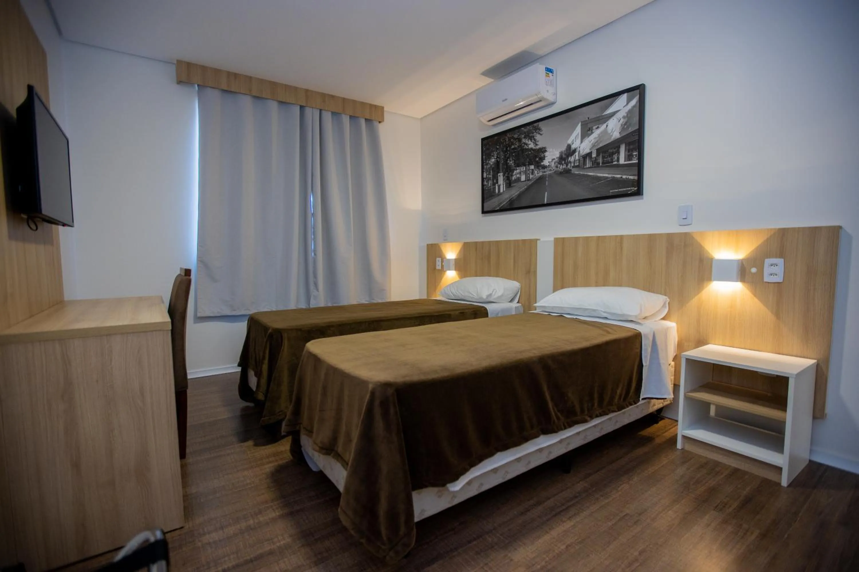 Bed in Tri Hotel Chapecó