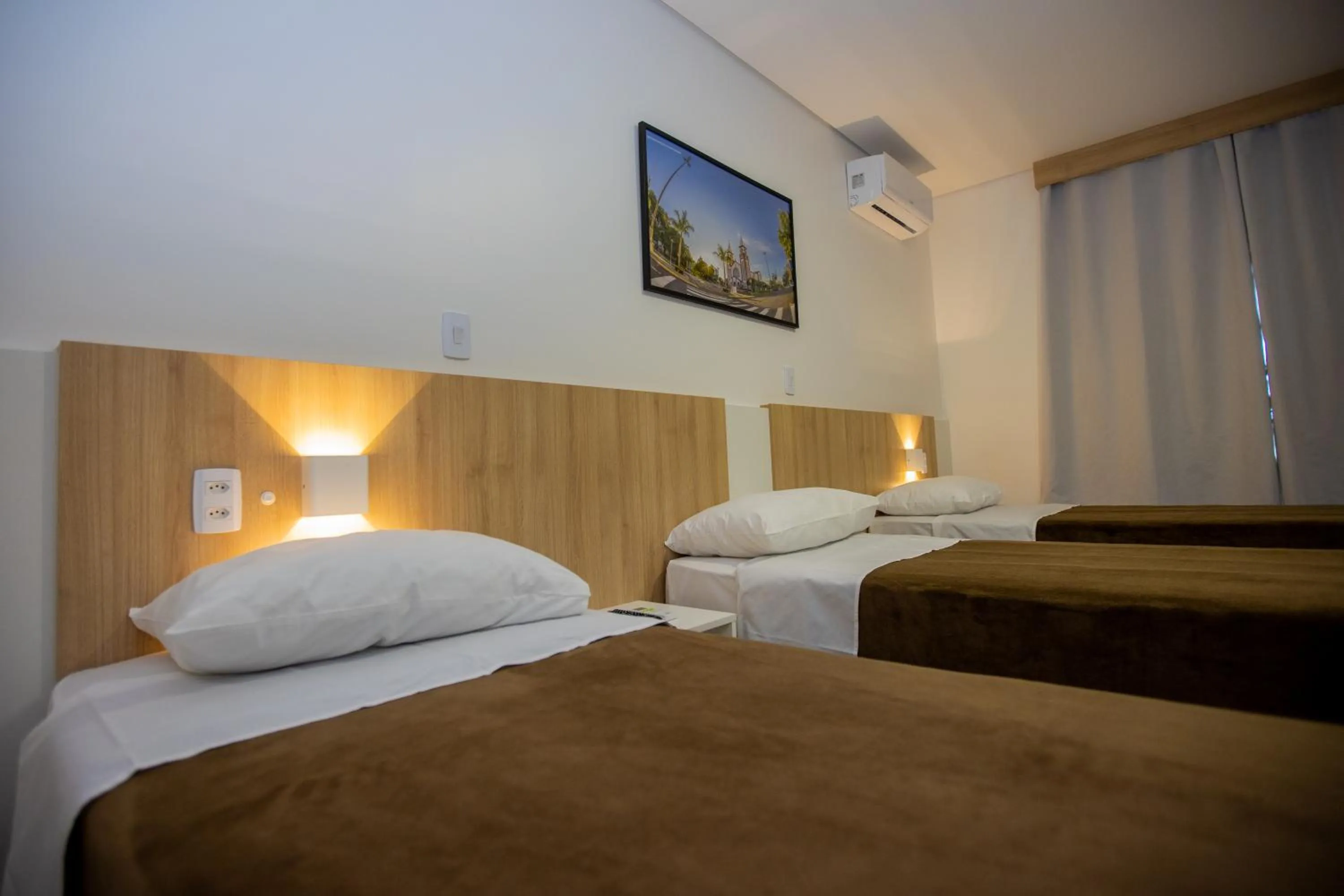 Bed in Tri Hotel Chapecó