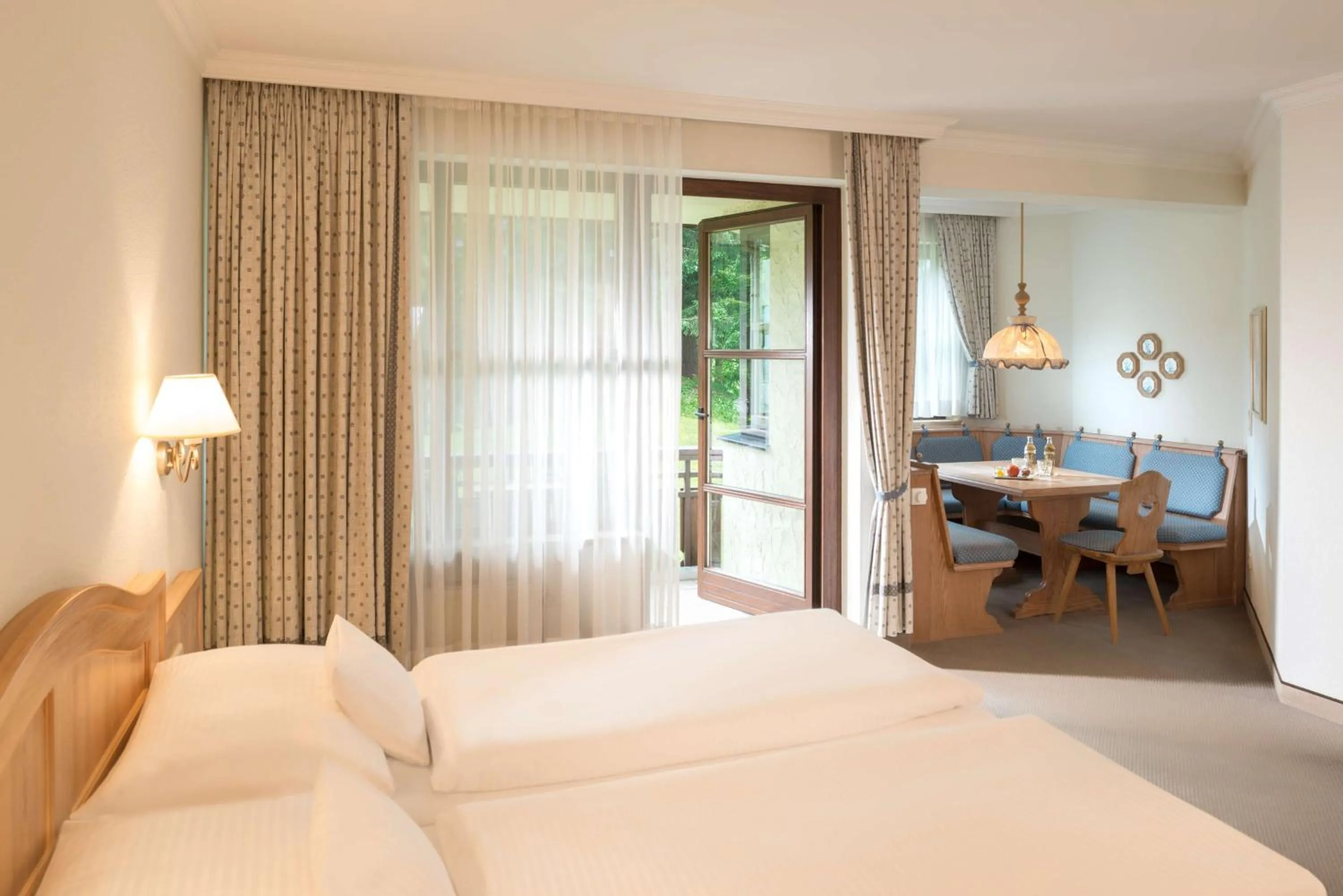 Photo of the whole room, Bed in Dorint Sporthotel Garmisch-Partenkirchen