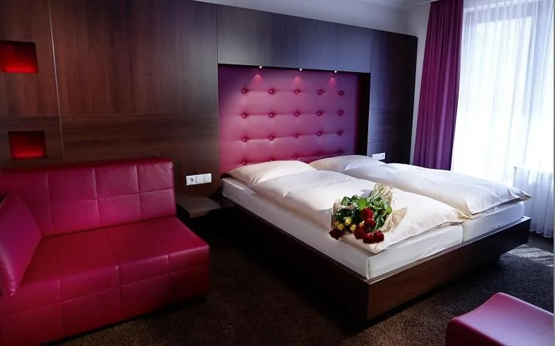 Photo of the whole room, Bed in Hotel Villa am Rhein