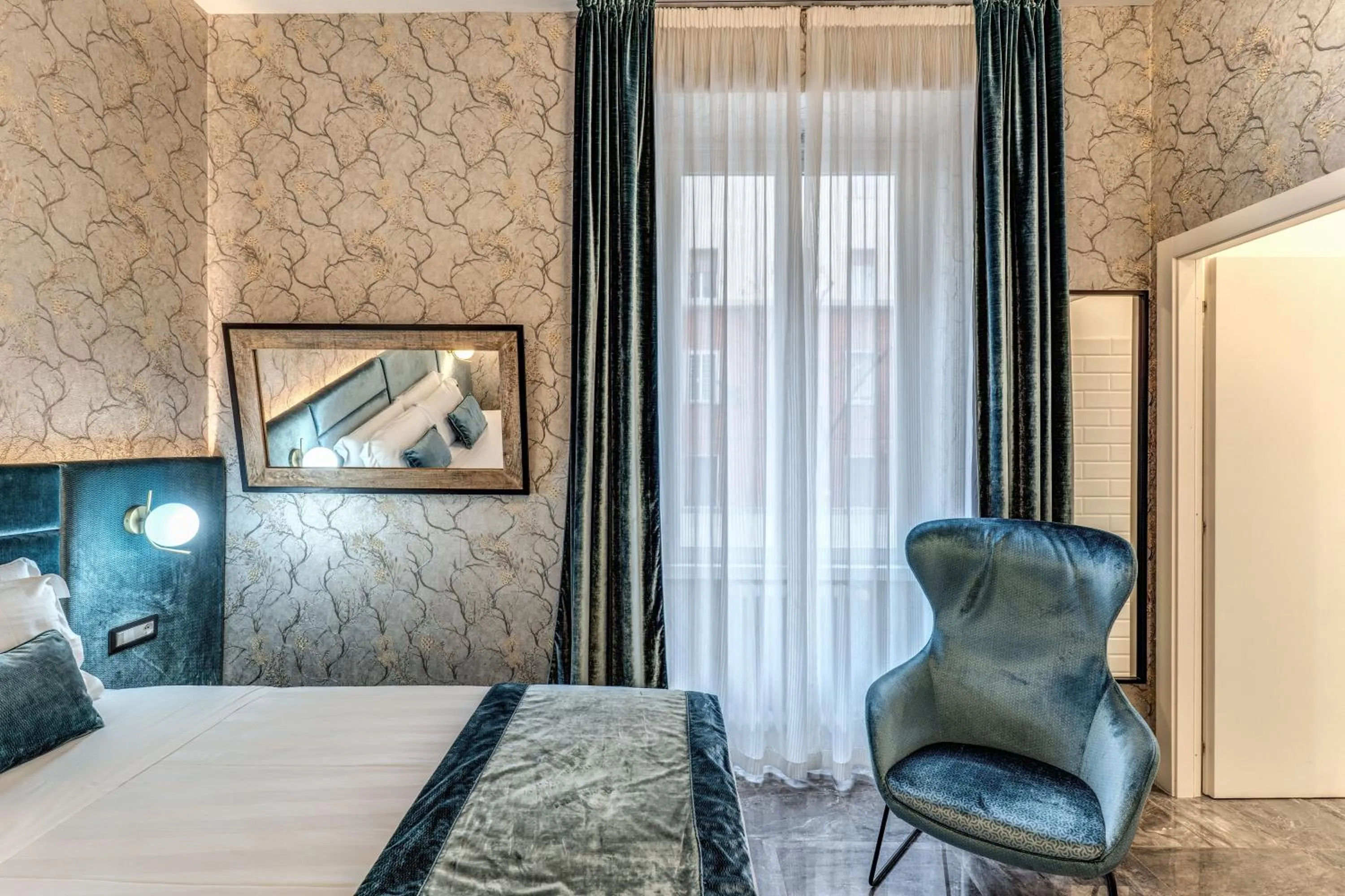 Bed in Apollo Boutique Hotel