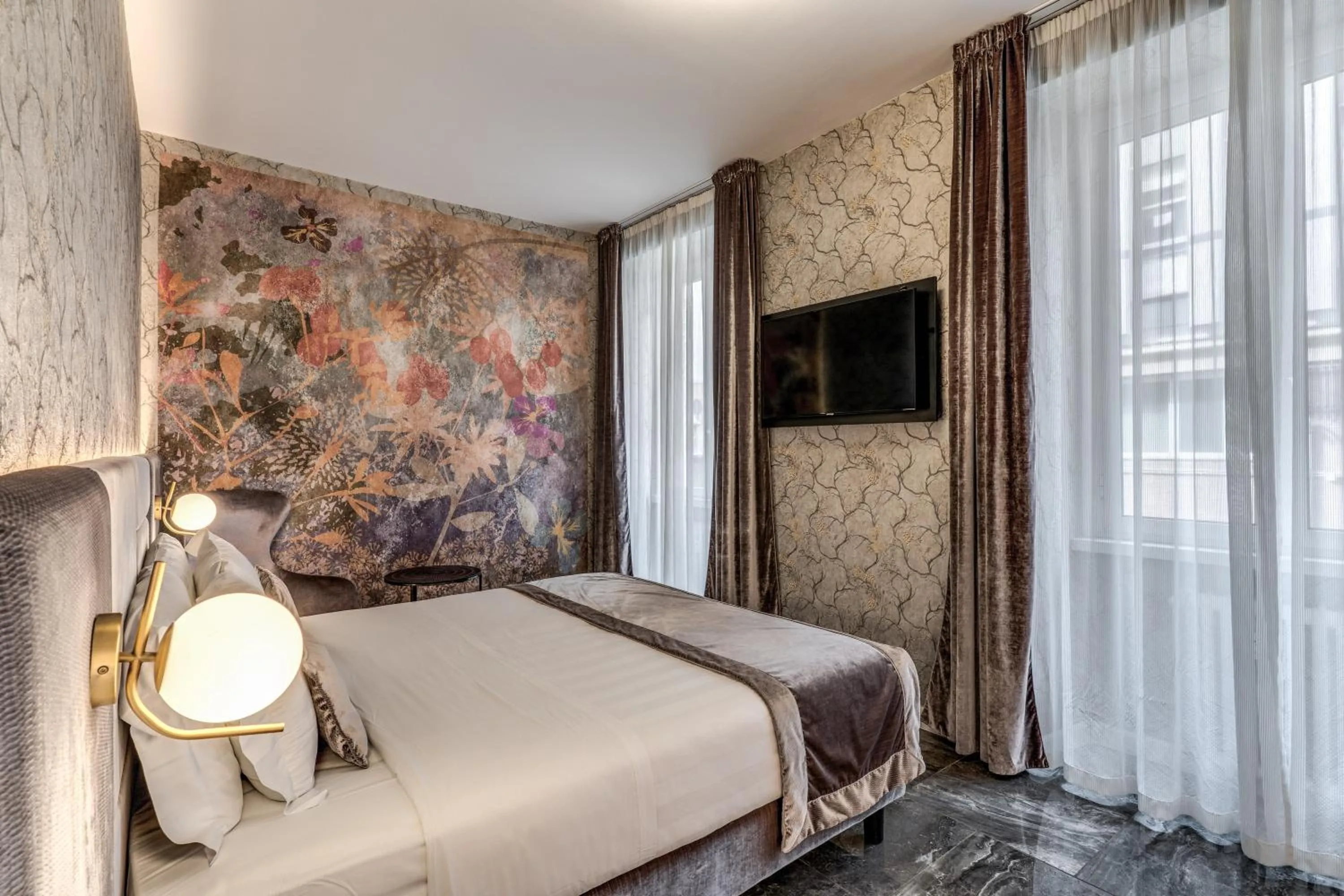 Bed in Apollo Boutique Hotel