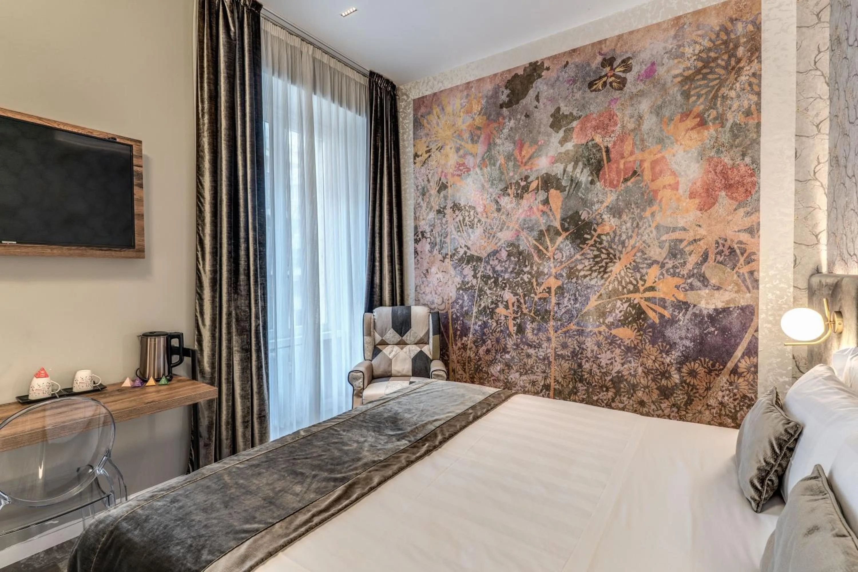 Bed in Apollo Boutique Hotel