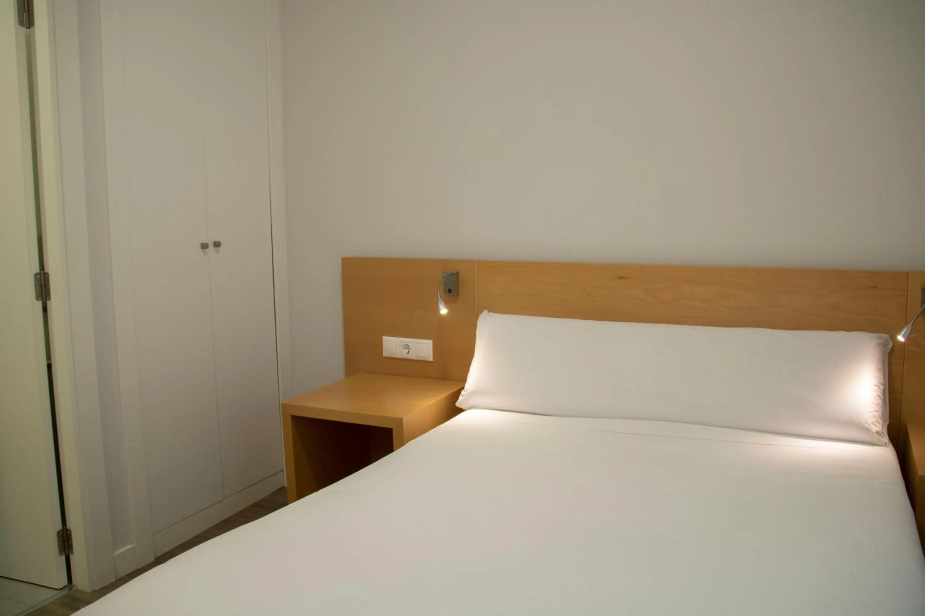 Bed in Alda Alborán Rooms