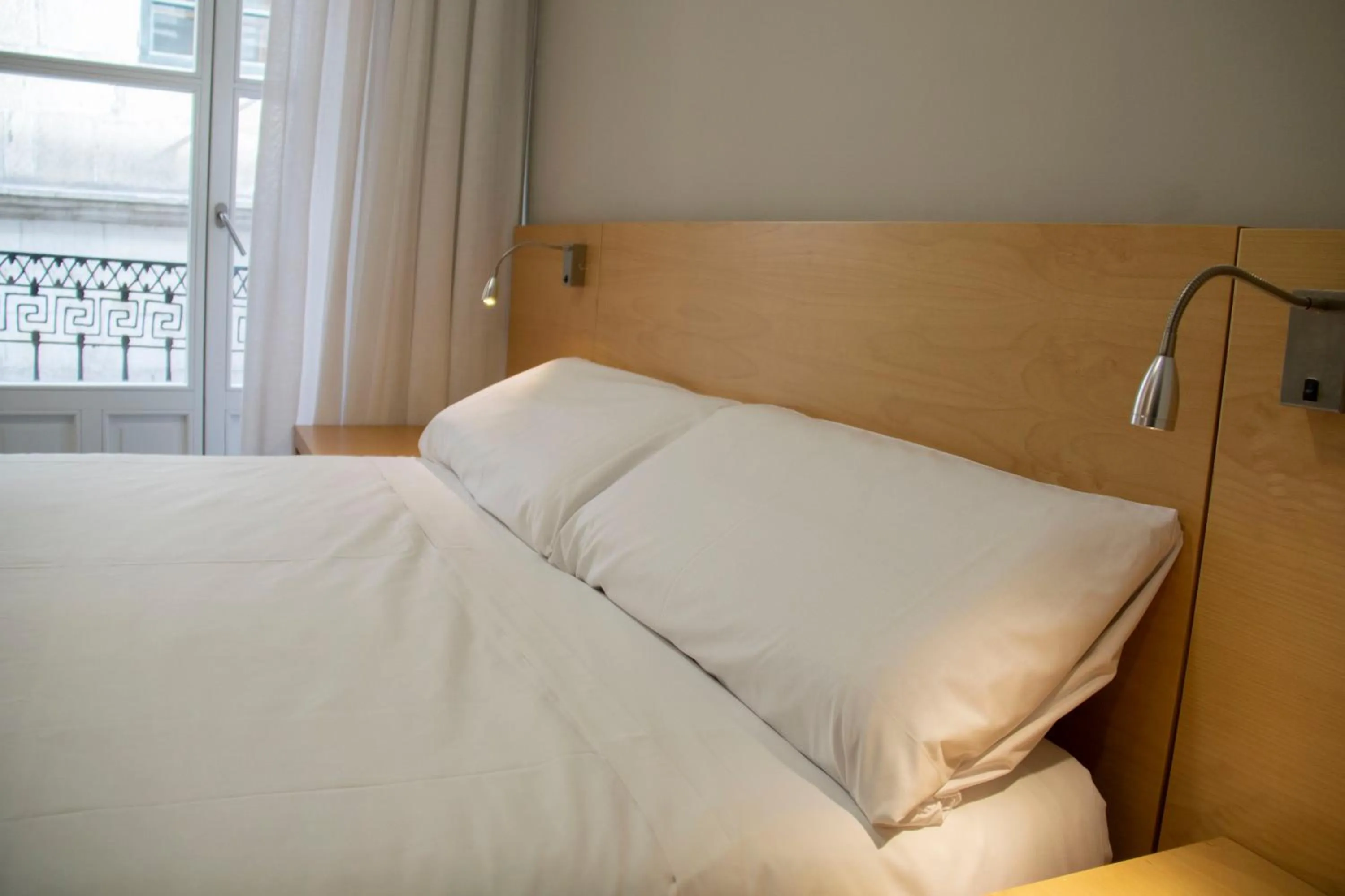 Bed in Alda Alborán Rooms