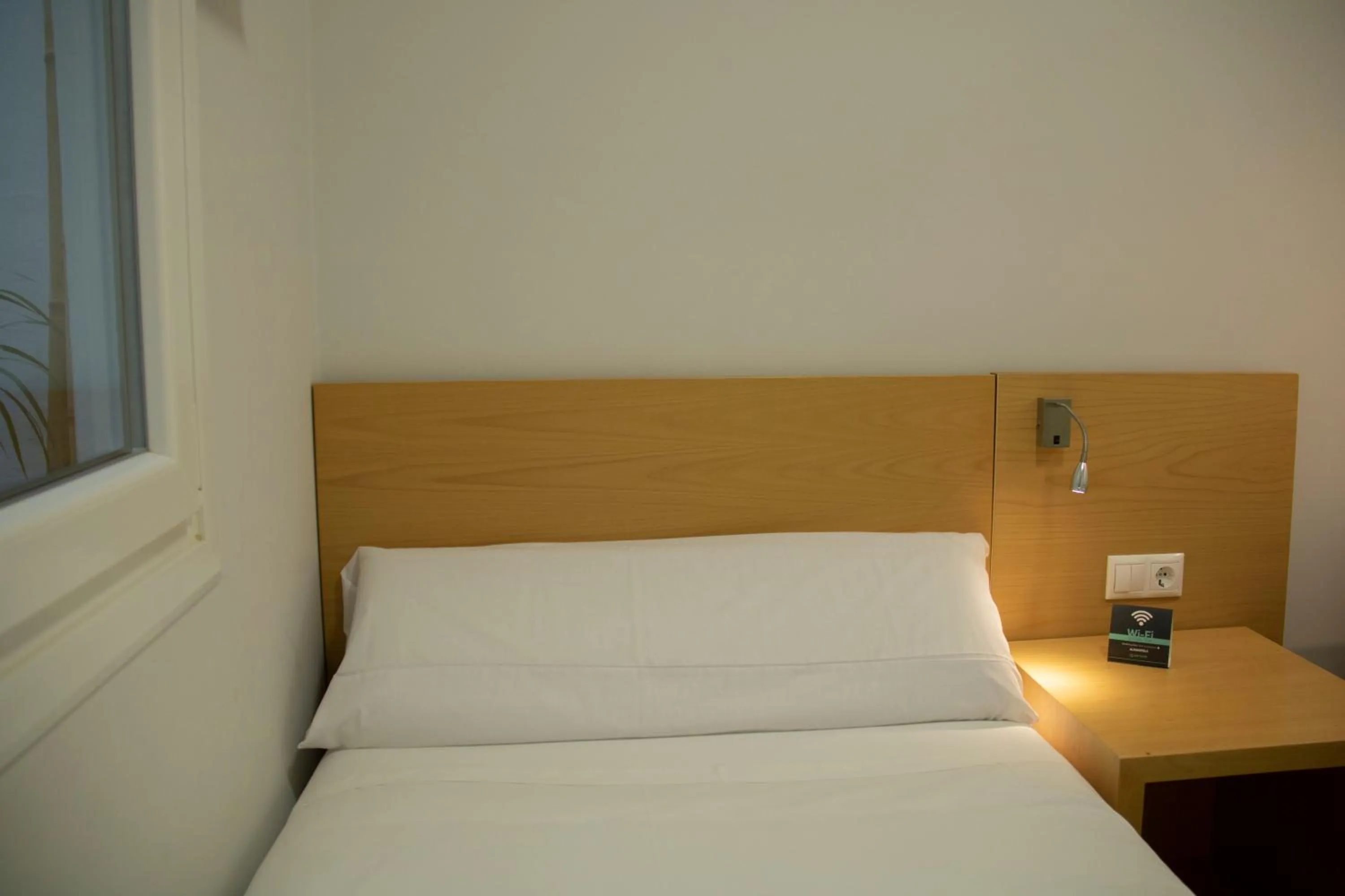 Bed in Alda Alborán Rooms