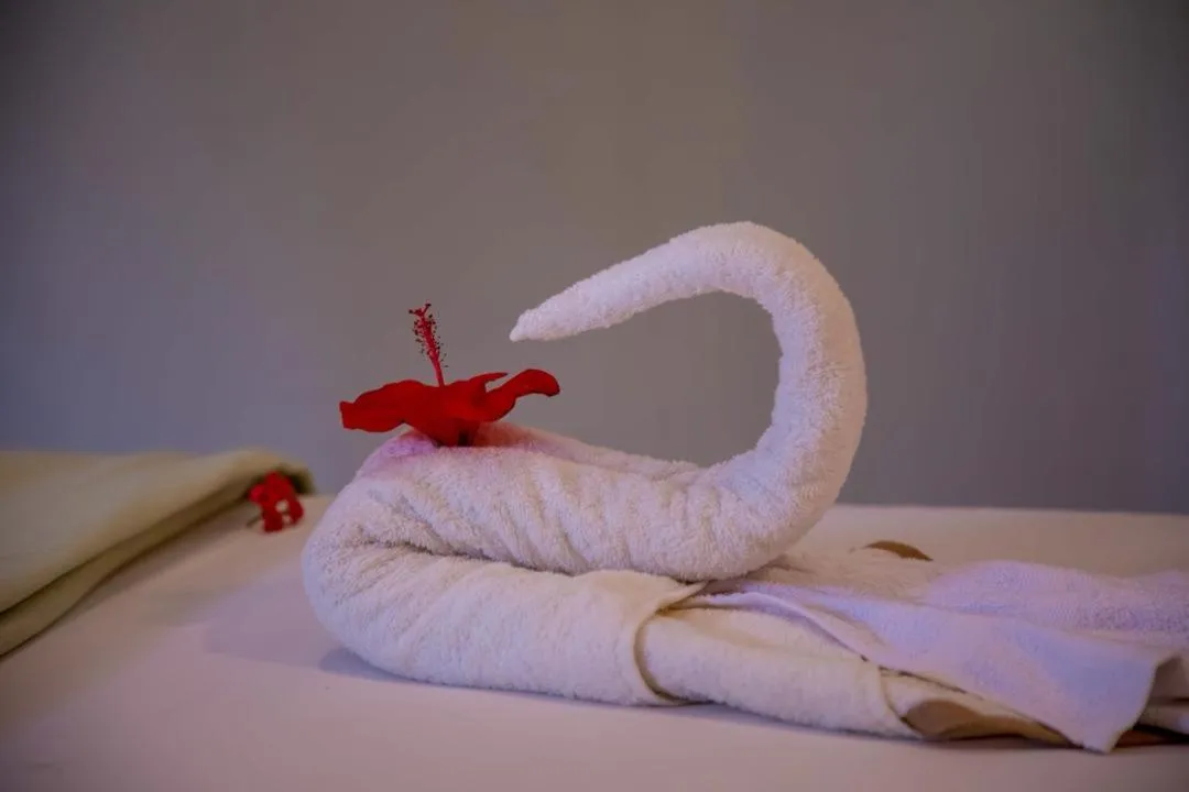 Bed in Tropic Garden Hotel