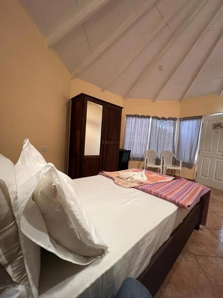 Bed in Tropic Garden Hotel