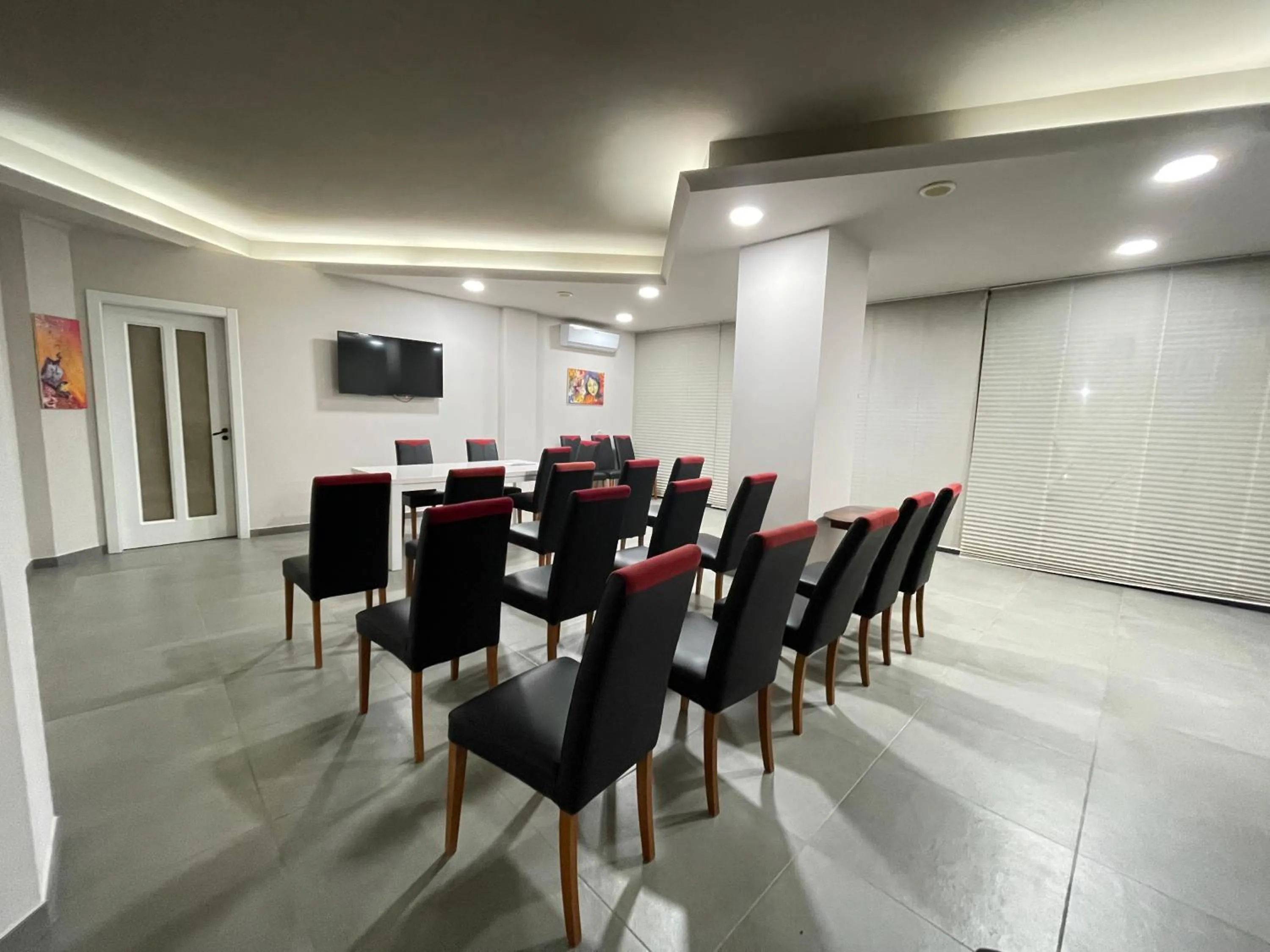 Communal lounge/ TV room in Hotel Le Ceramiche