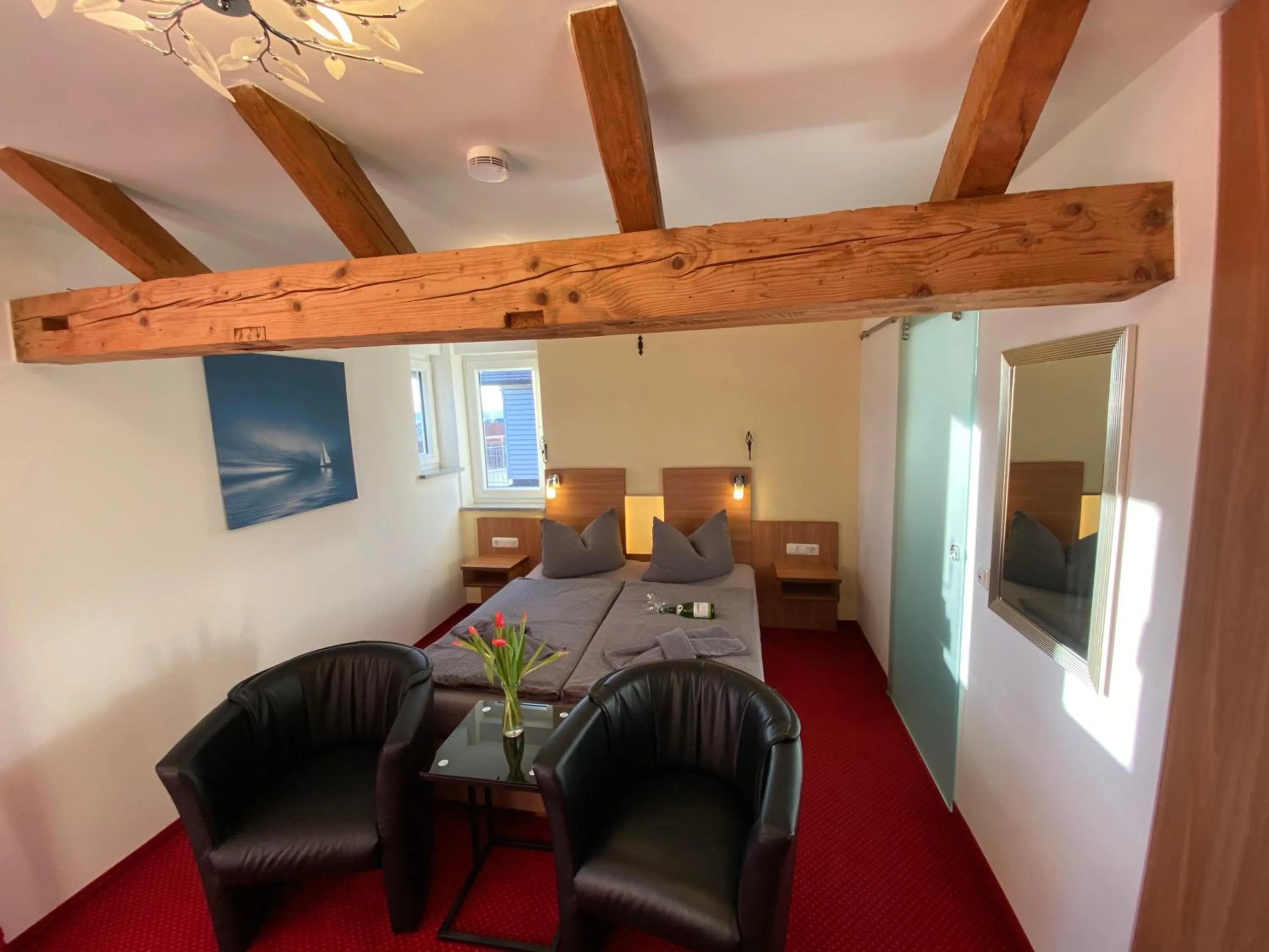 Photo of the whole room, Bed in BnB Fliegerhaeusle Hagnau 24h Self Check In