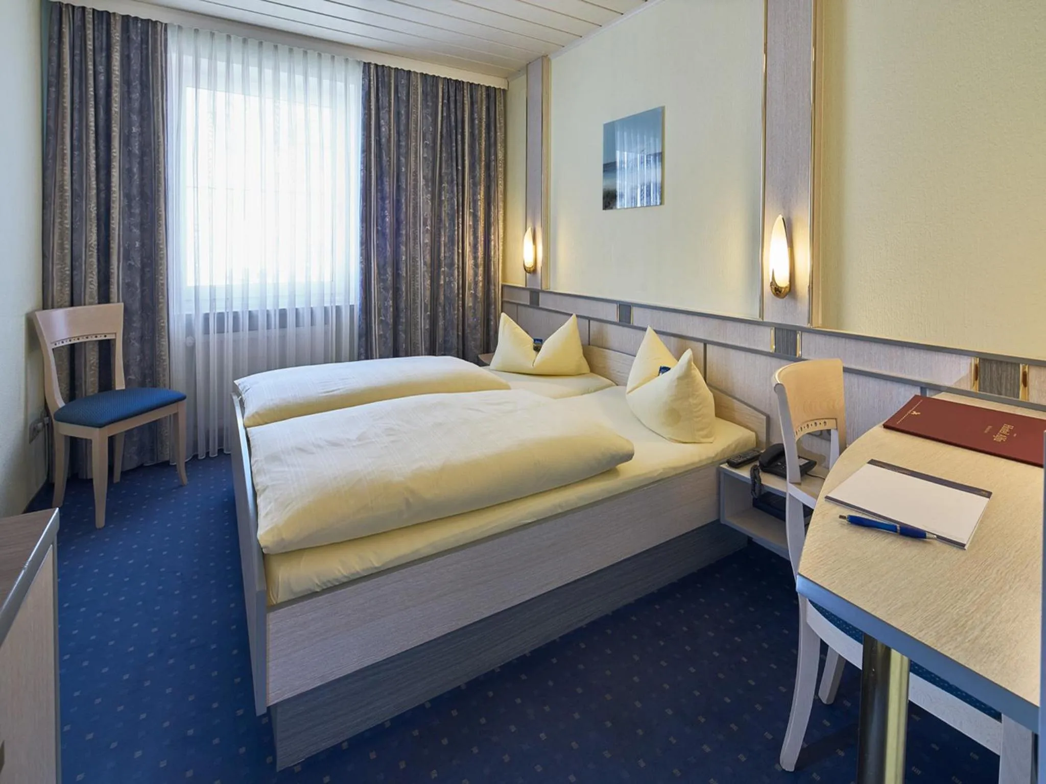 Bed in Hotel Alfa Zentrum