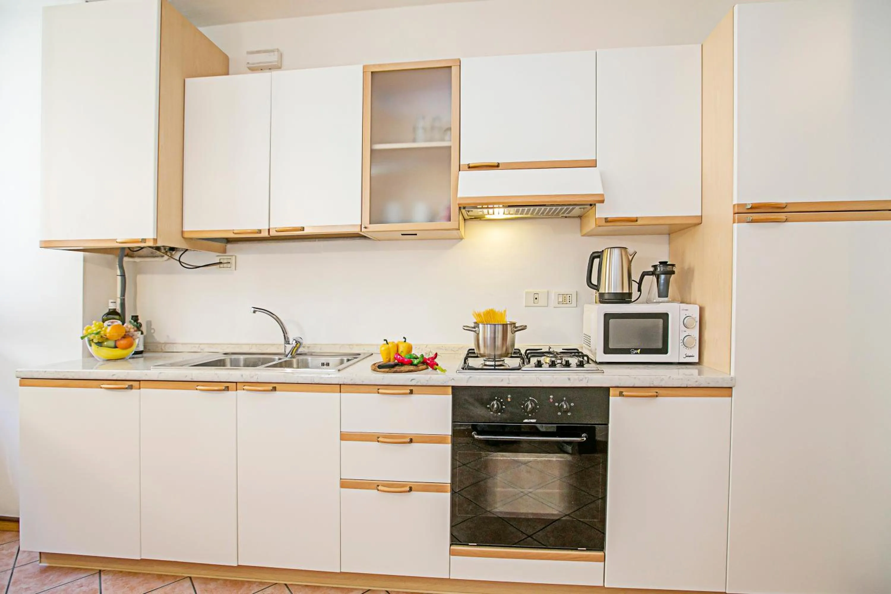 Kitchen or kitchenette in Appartamento Centro Storico Riva 2 - Happy Rentals