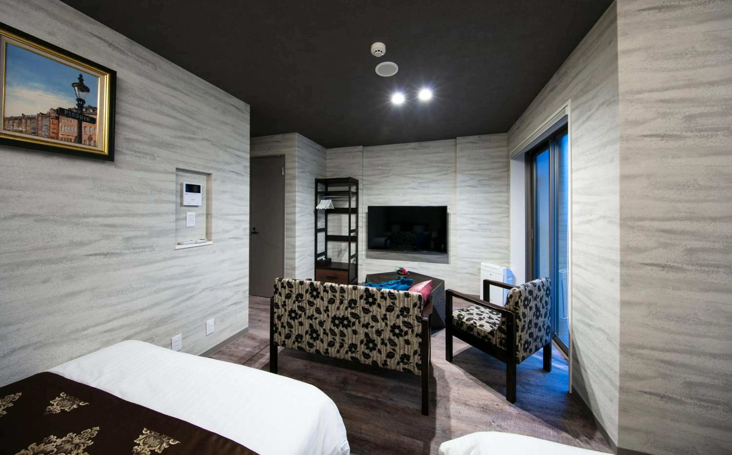 Living room, Bed in GRAND BASE Takamatsu