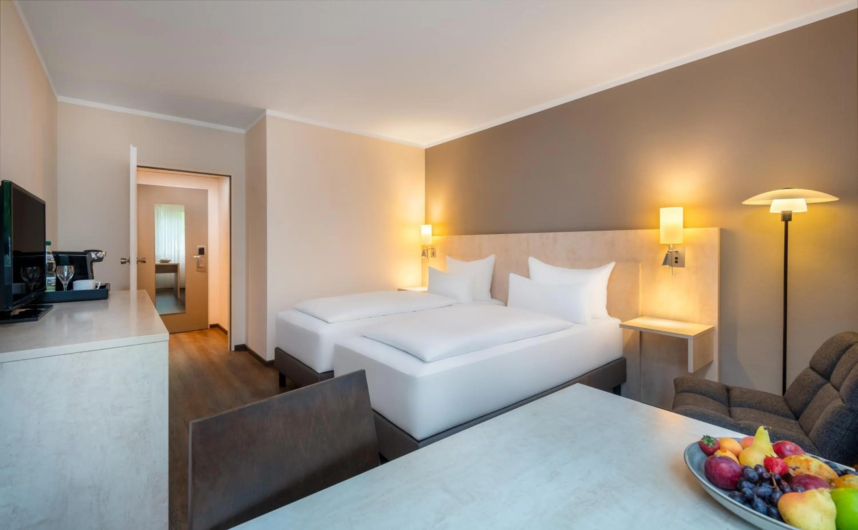 Photo of the whole room, Bed in Mercure Hotel Bielefeld Johannisberg