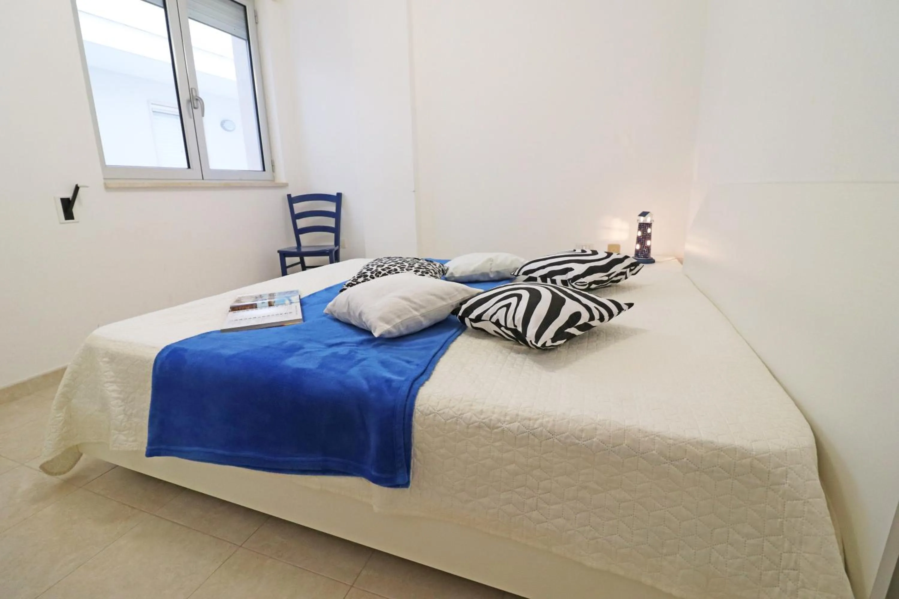 Bed in Holiday home angel in Otranto, apartment with 4 beds, with sea view.