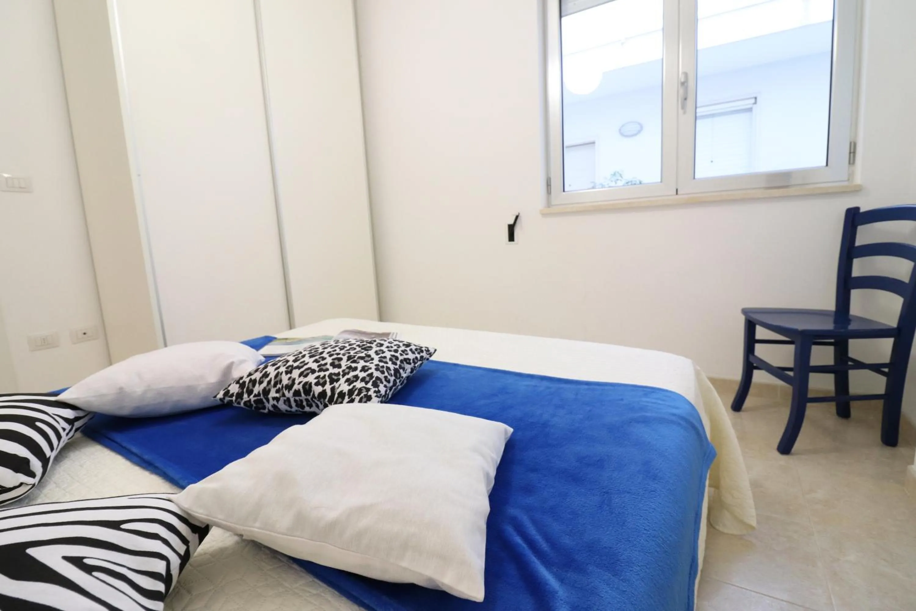 Bed in Holiday home angel in Otranto, apartment with 4 beds, with sea view.