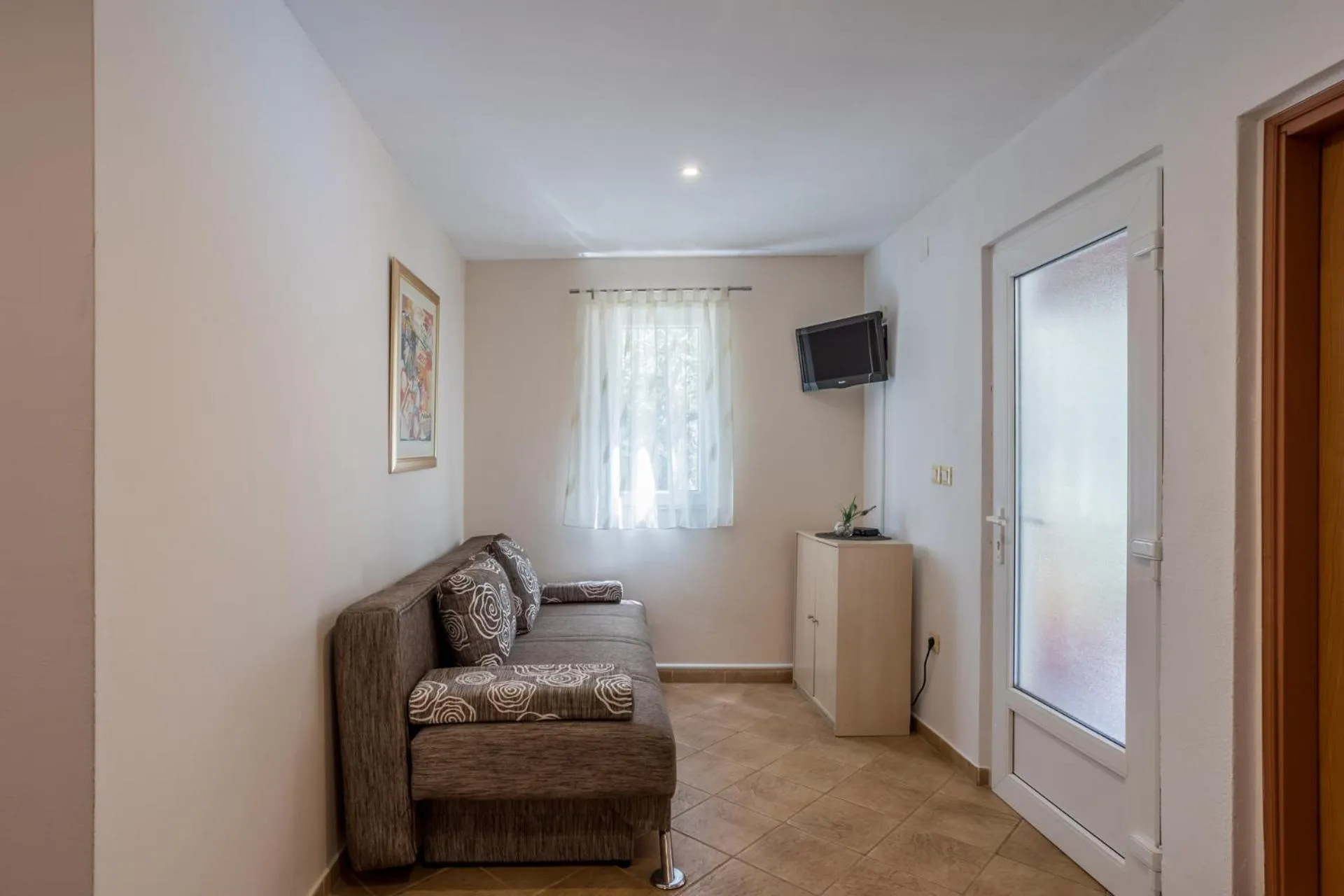 Seating Area in House with big walled oliva garden