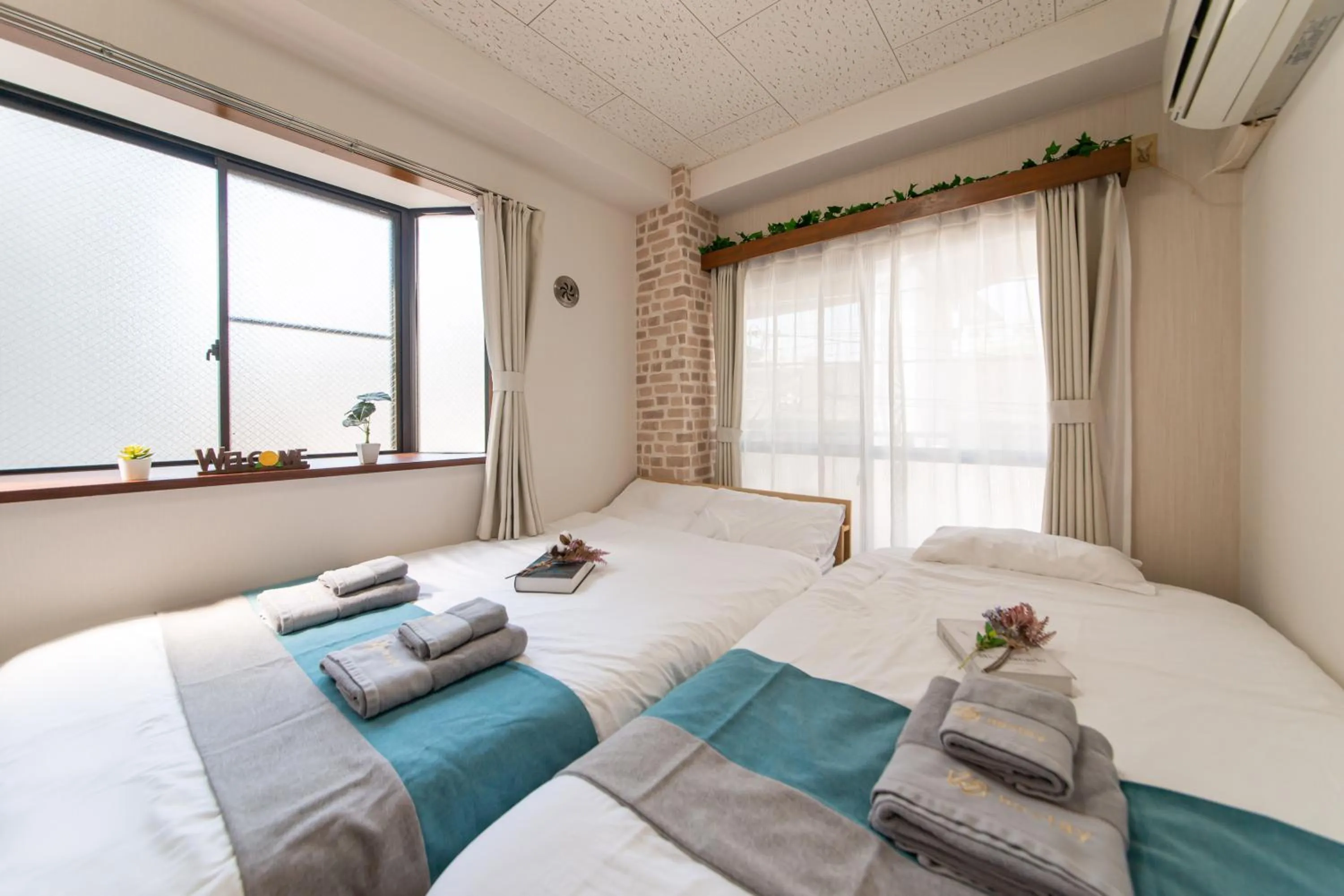 Bed in nestay suite tokyo tabata