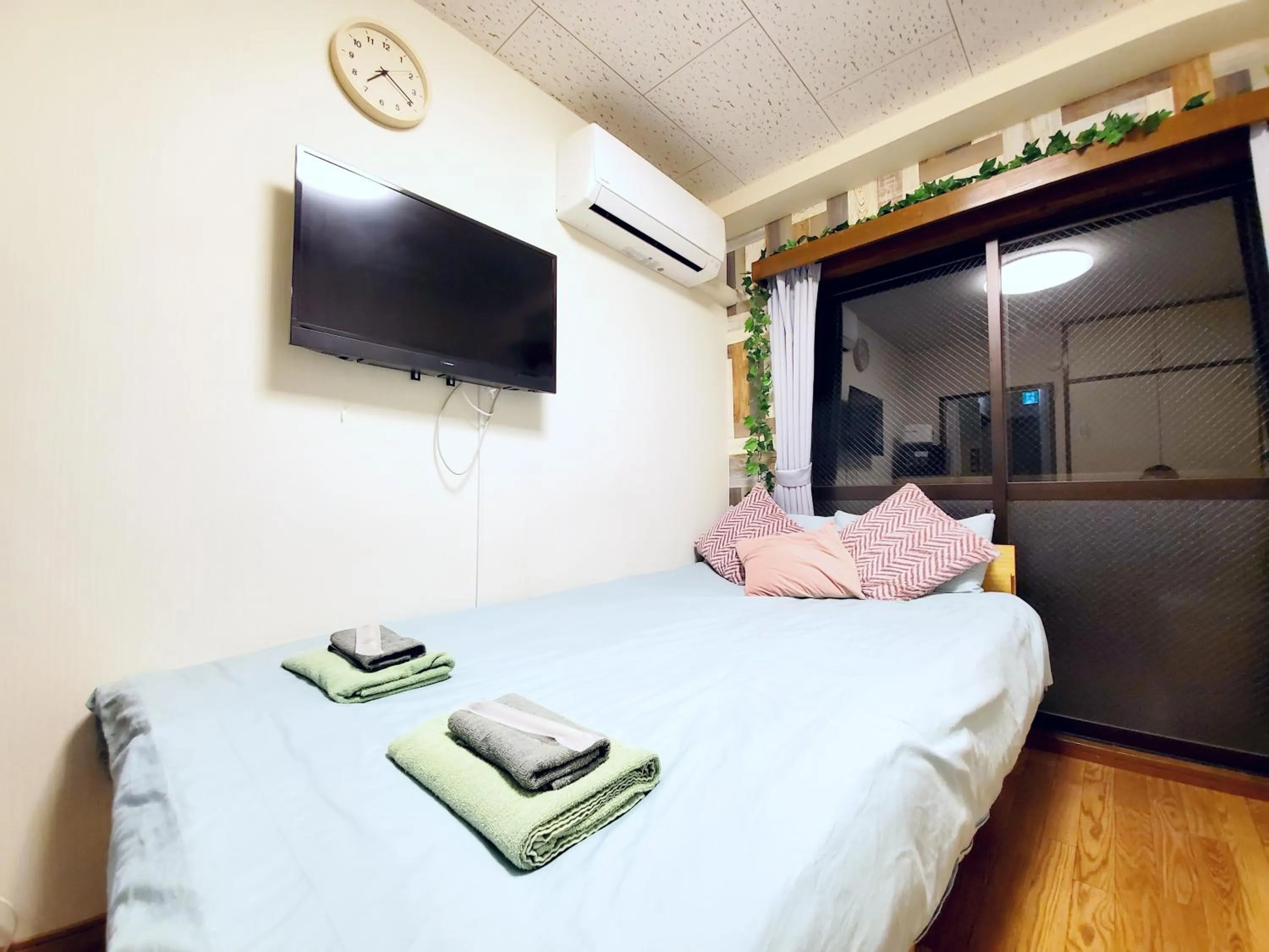 Bed in nestay suite tokyo tabata