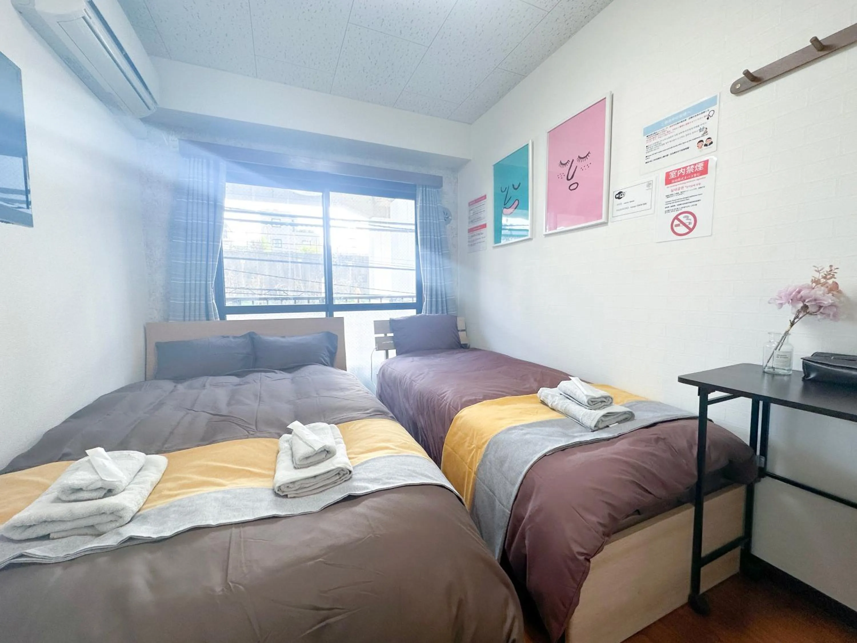 Bed in nestay suite tokyo tabata