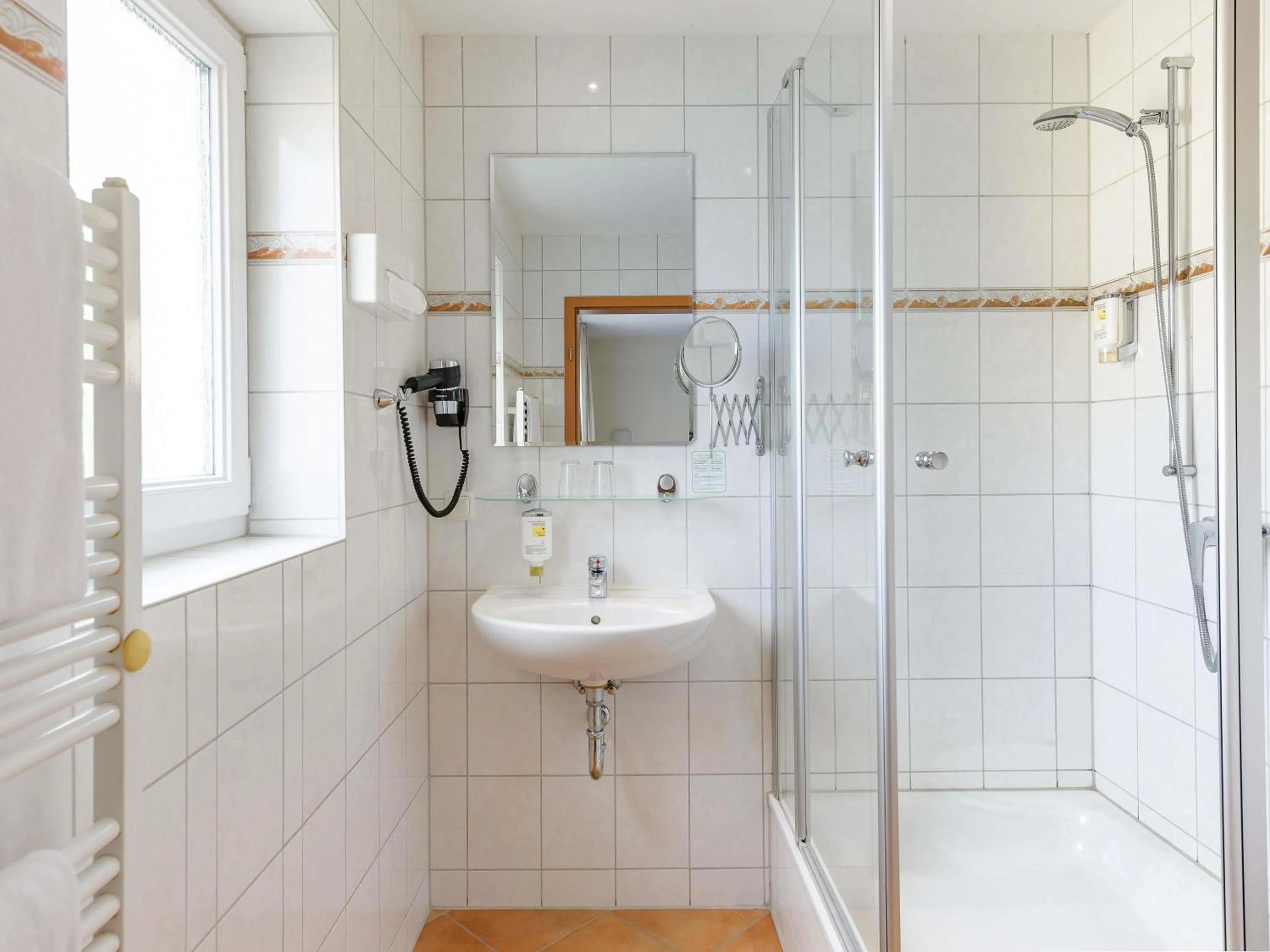 Bedroom in Mercure Hotel Luebeck City Center