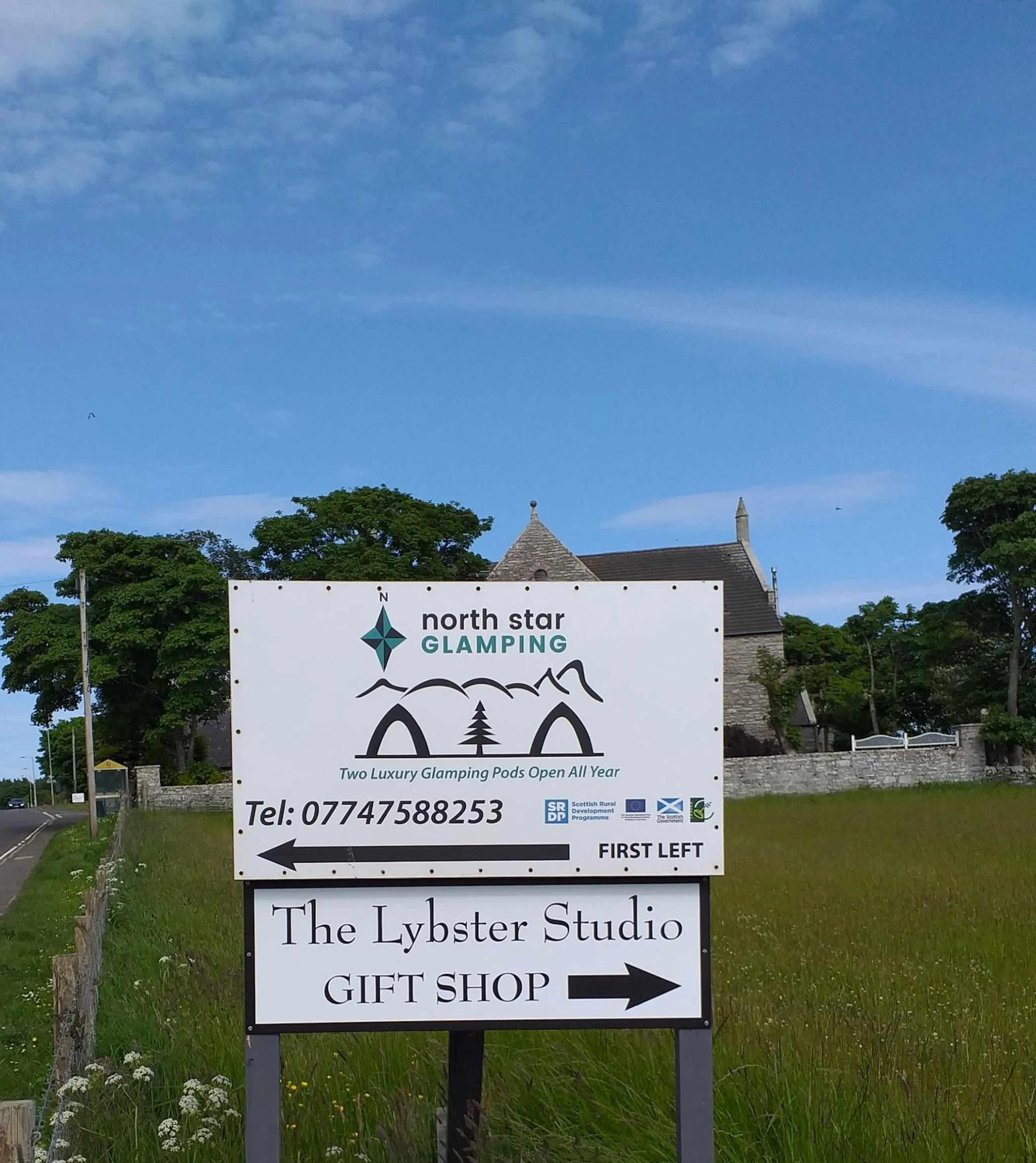 Property logo or sign in North Star Glamping