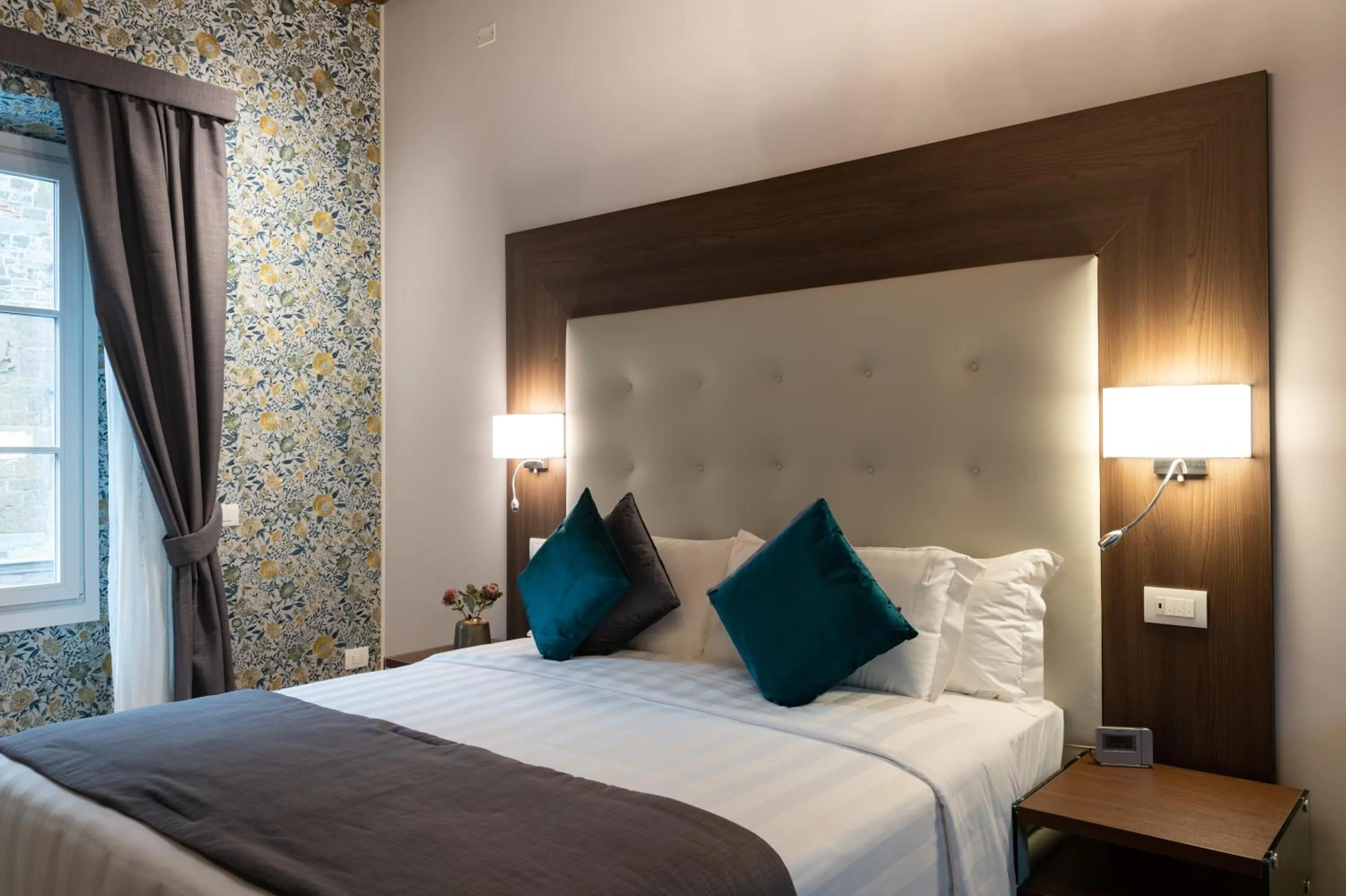 Bed in Kairos by Florence Art Apartments