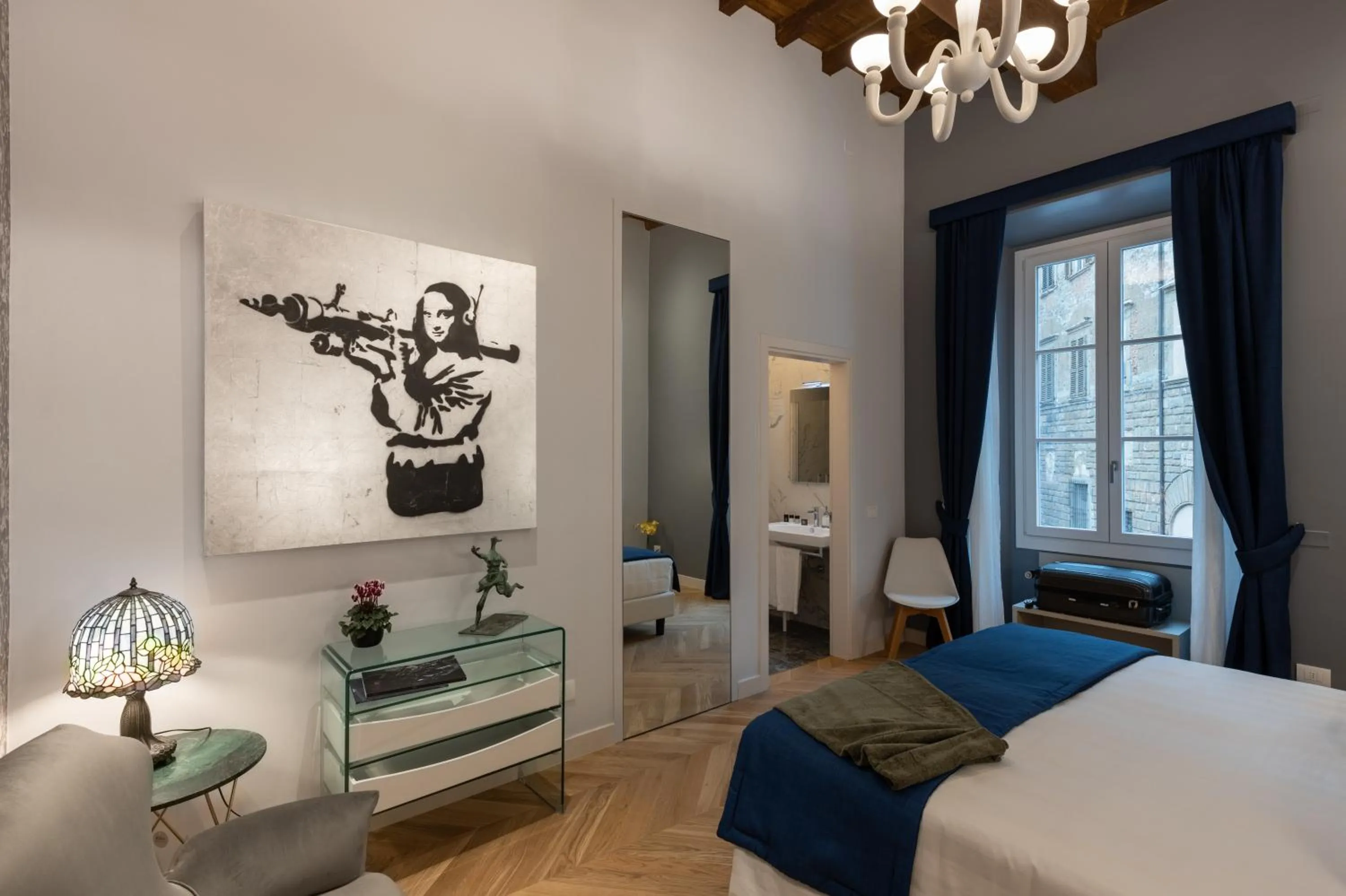 Decorative detail, Bed in Kairos by Florence Art Apartments