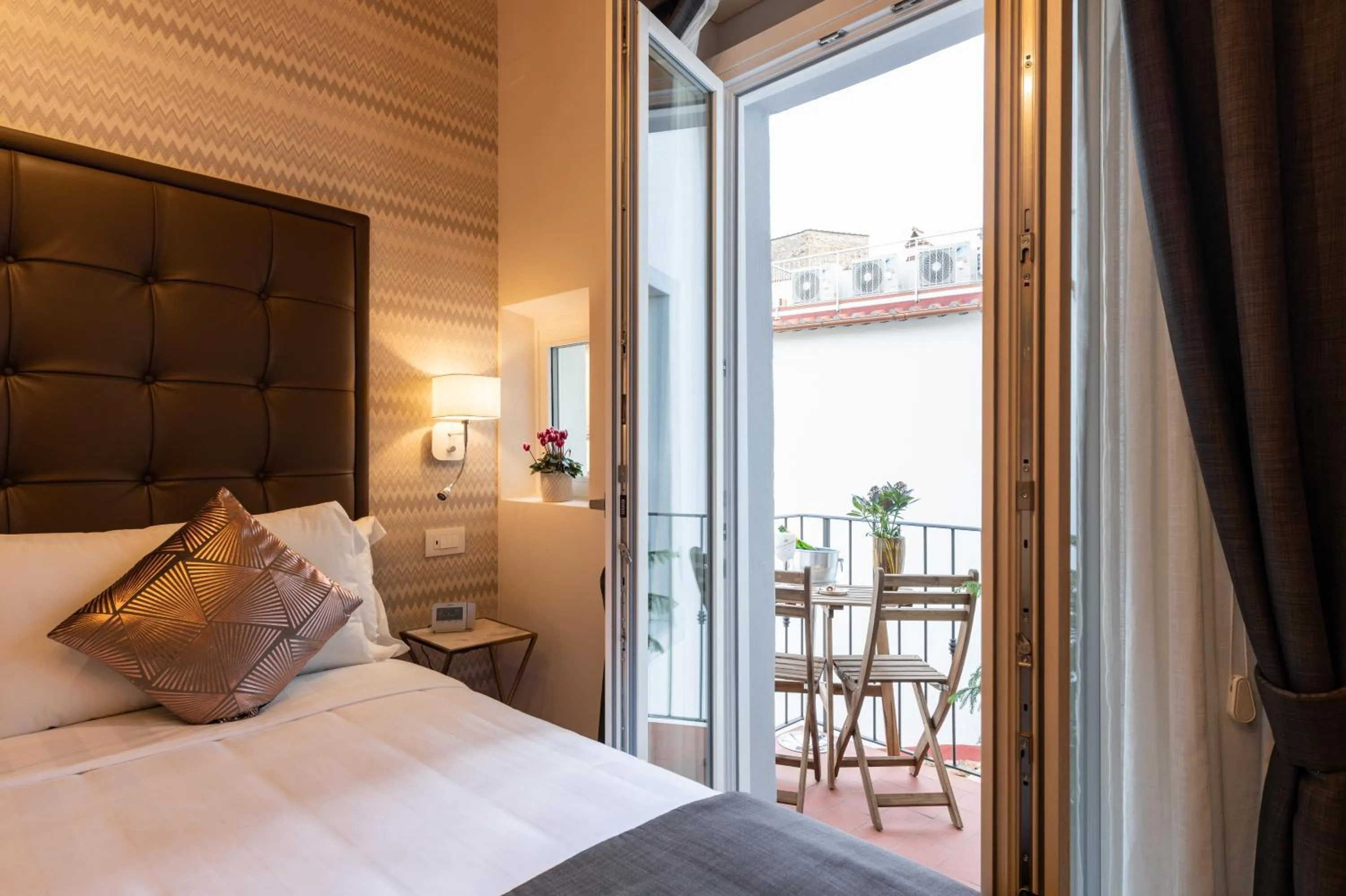 Bed in Kairos by Florence Art Apartments