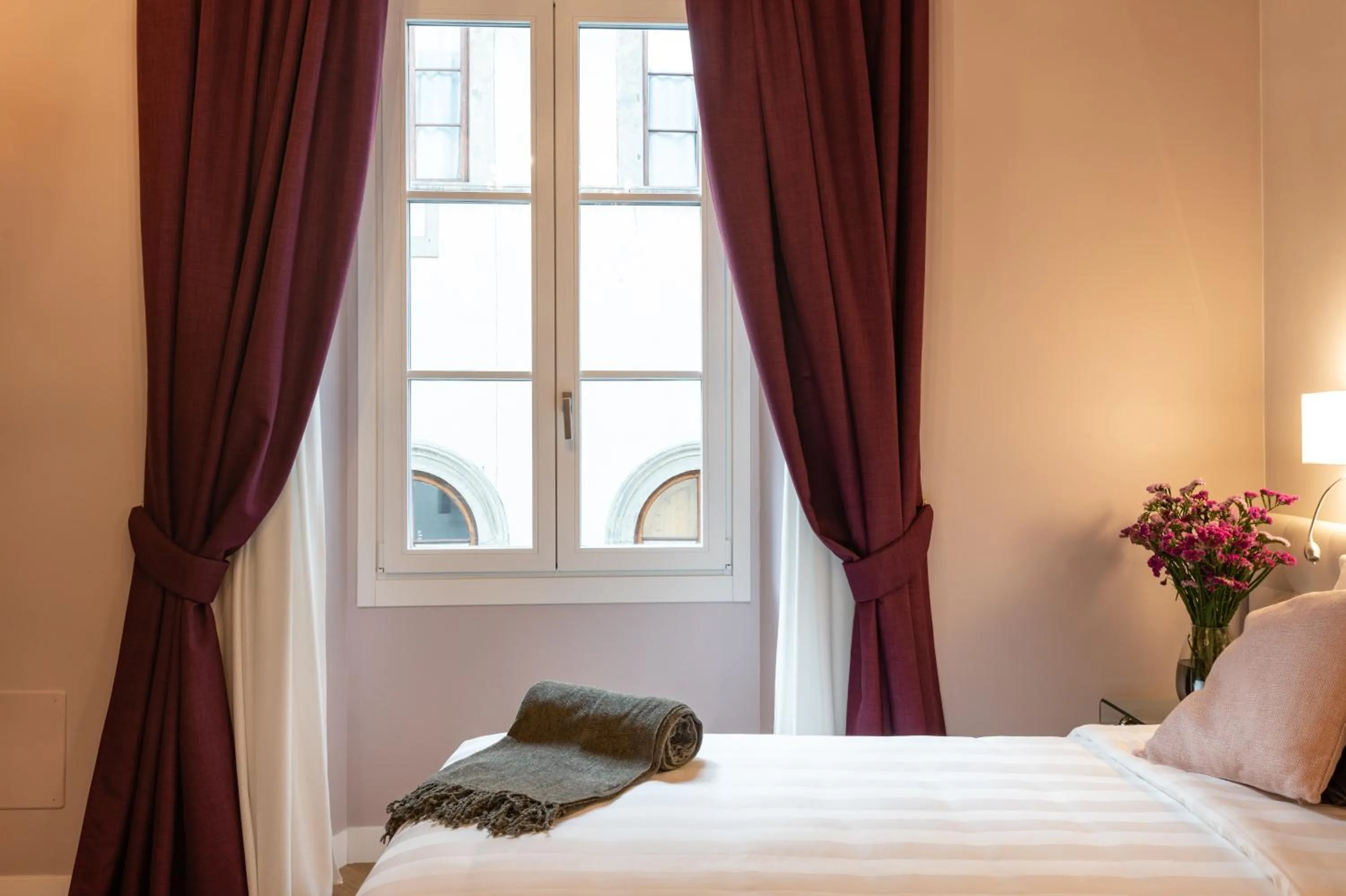 Bed in Kairos by Florence Art Apartments