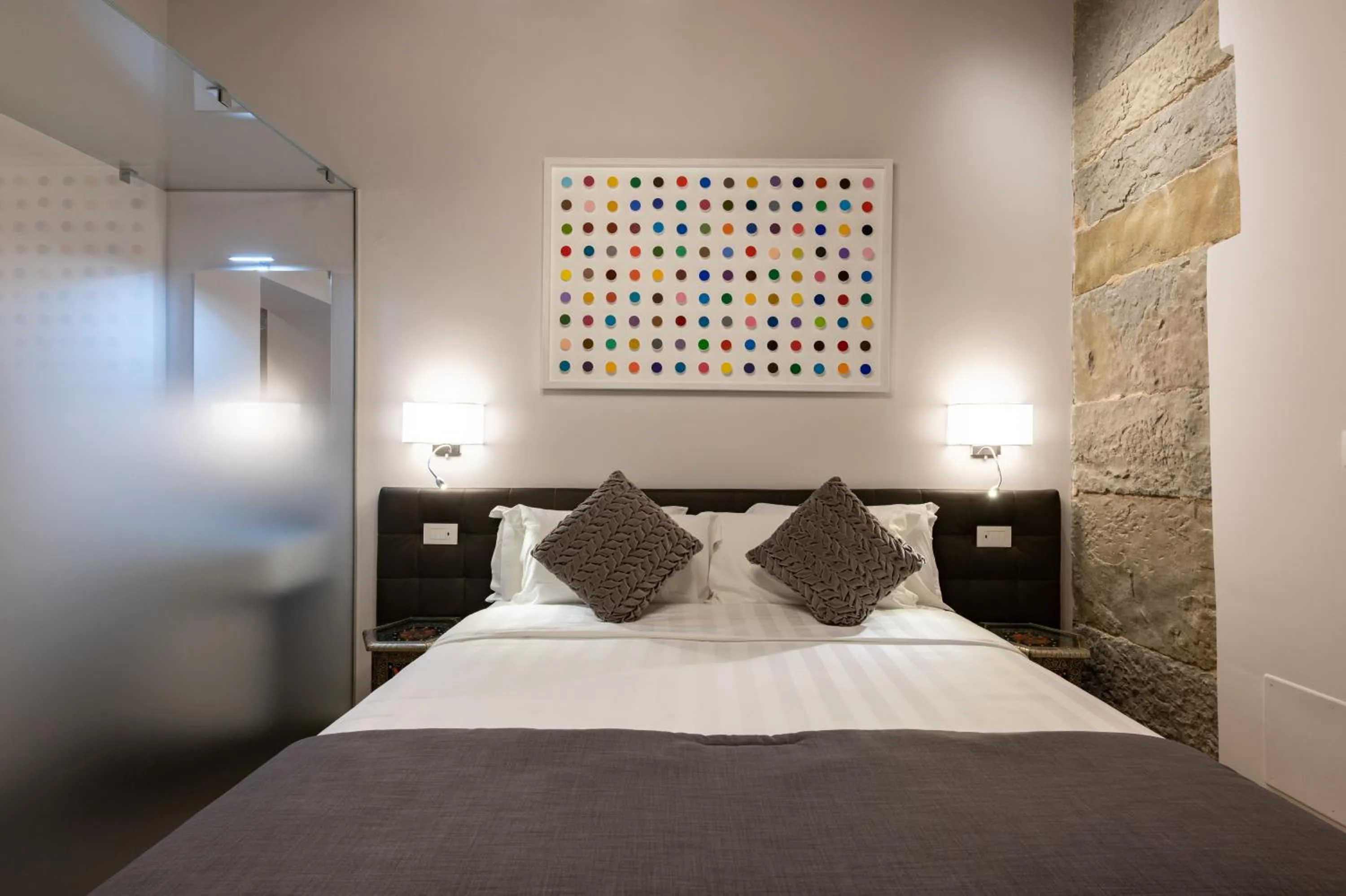 Bed in Kairos by Florence Art Apartments