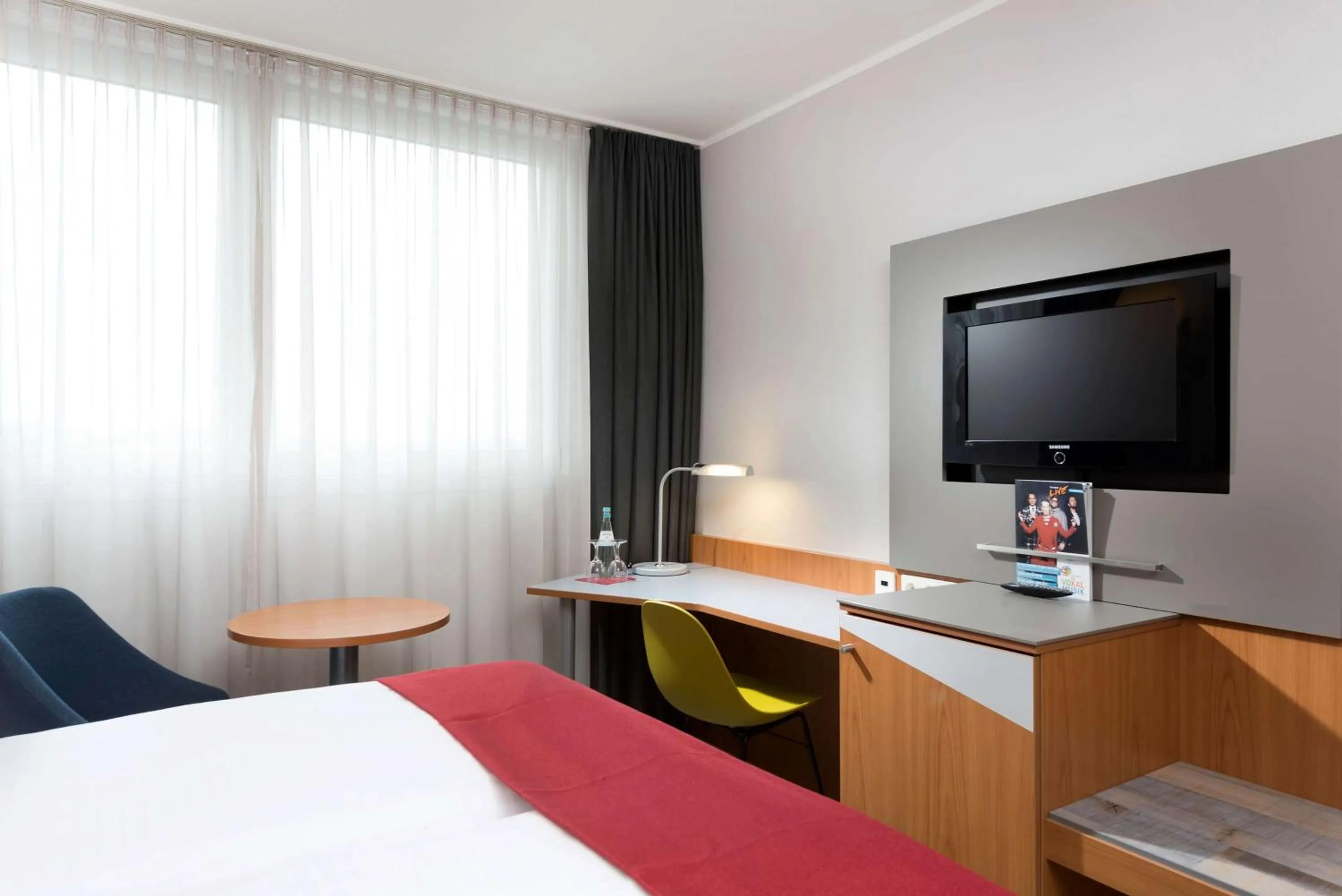 Photo of the whole room, Bed in Ramada by Wyndham Hannover Messe