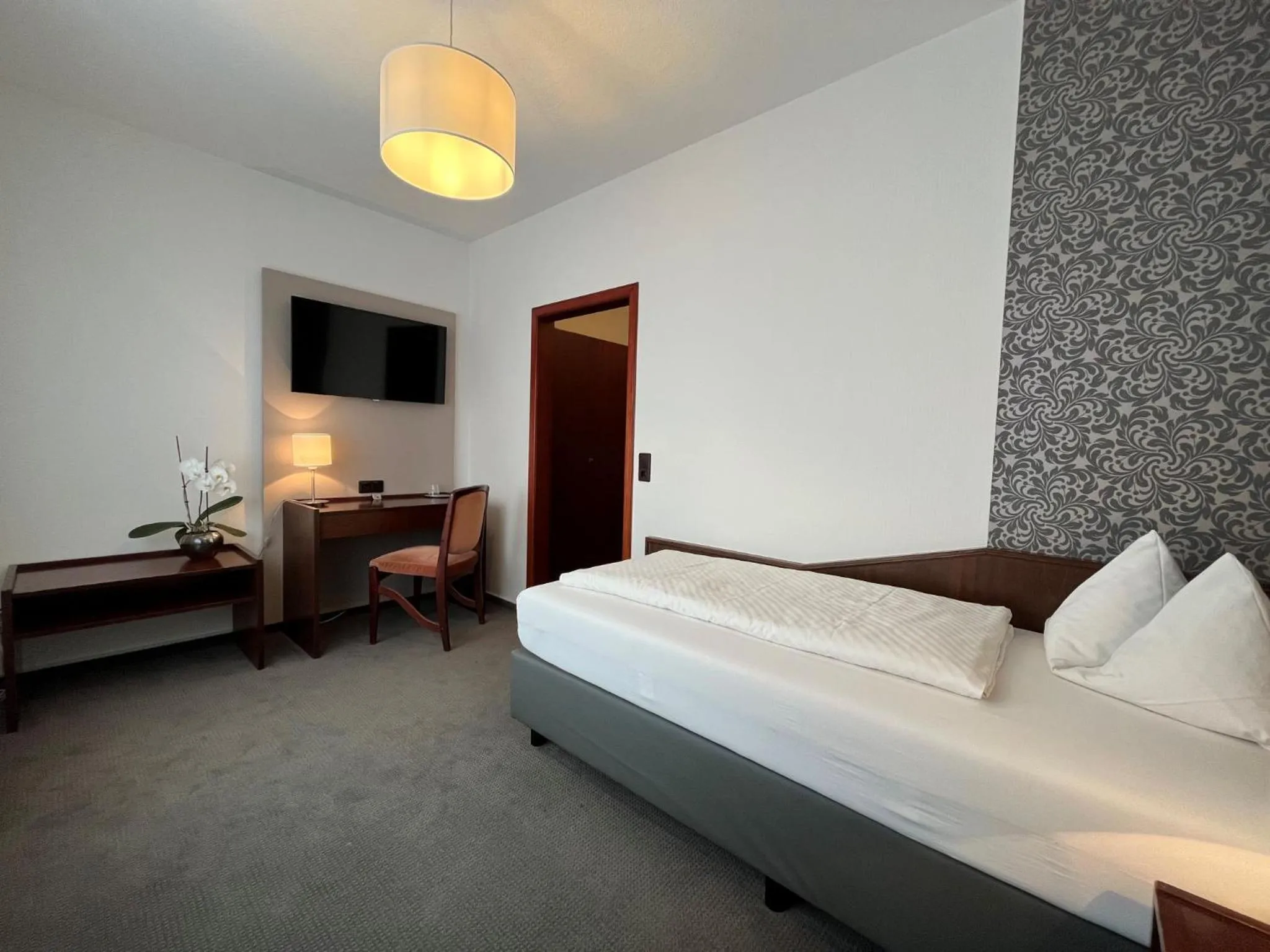 Photo of the whole room, Bed in Hotel Garni Geisler