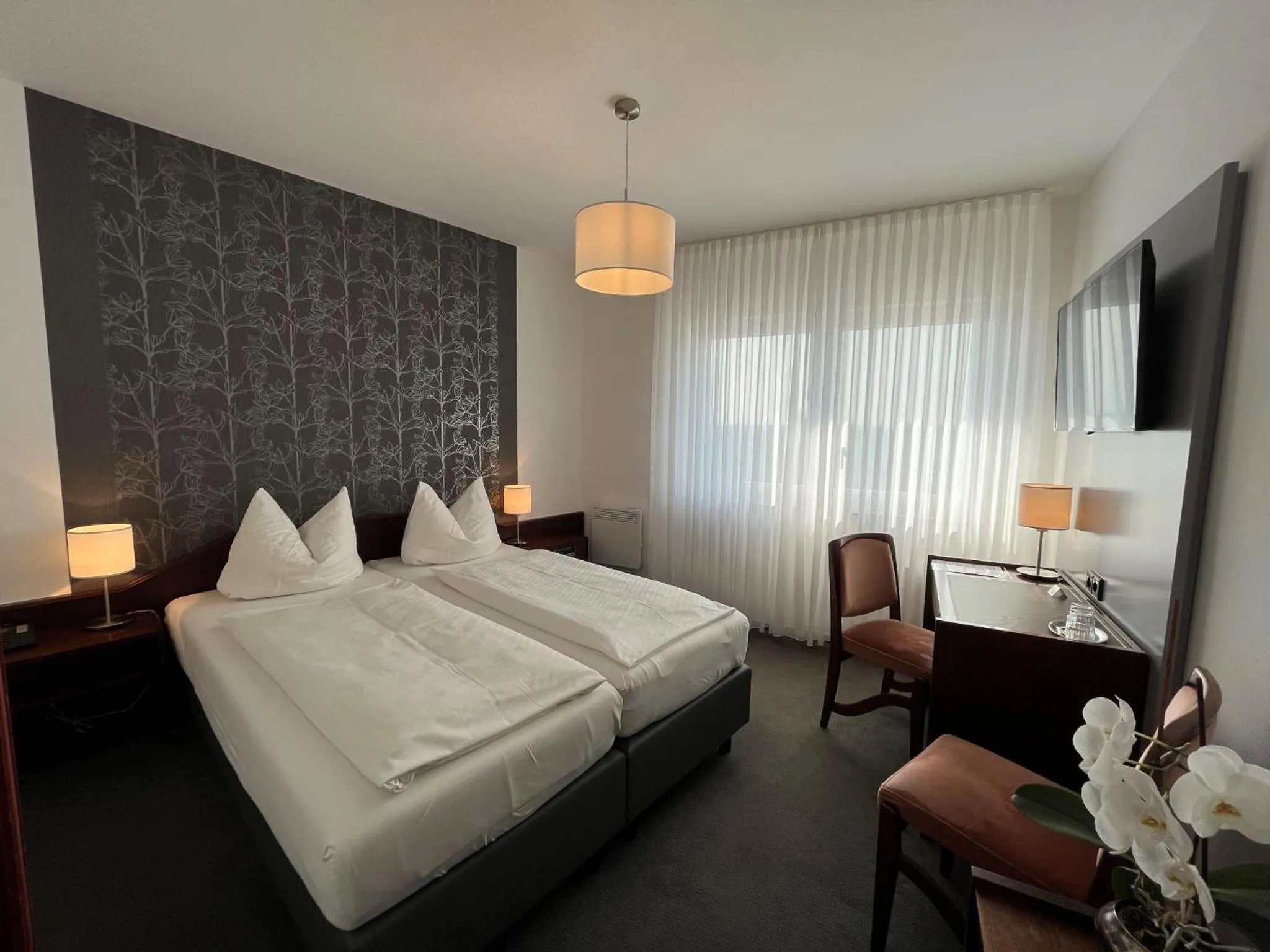 Photo of the whole room, Bed in Hotel Garni Geisler