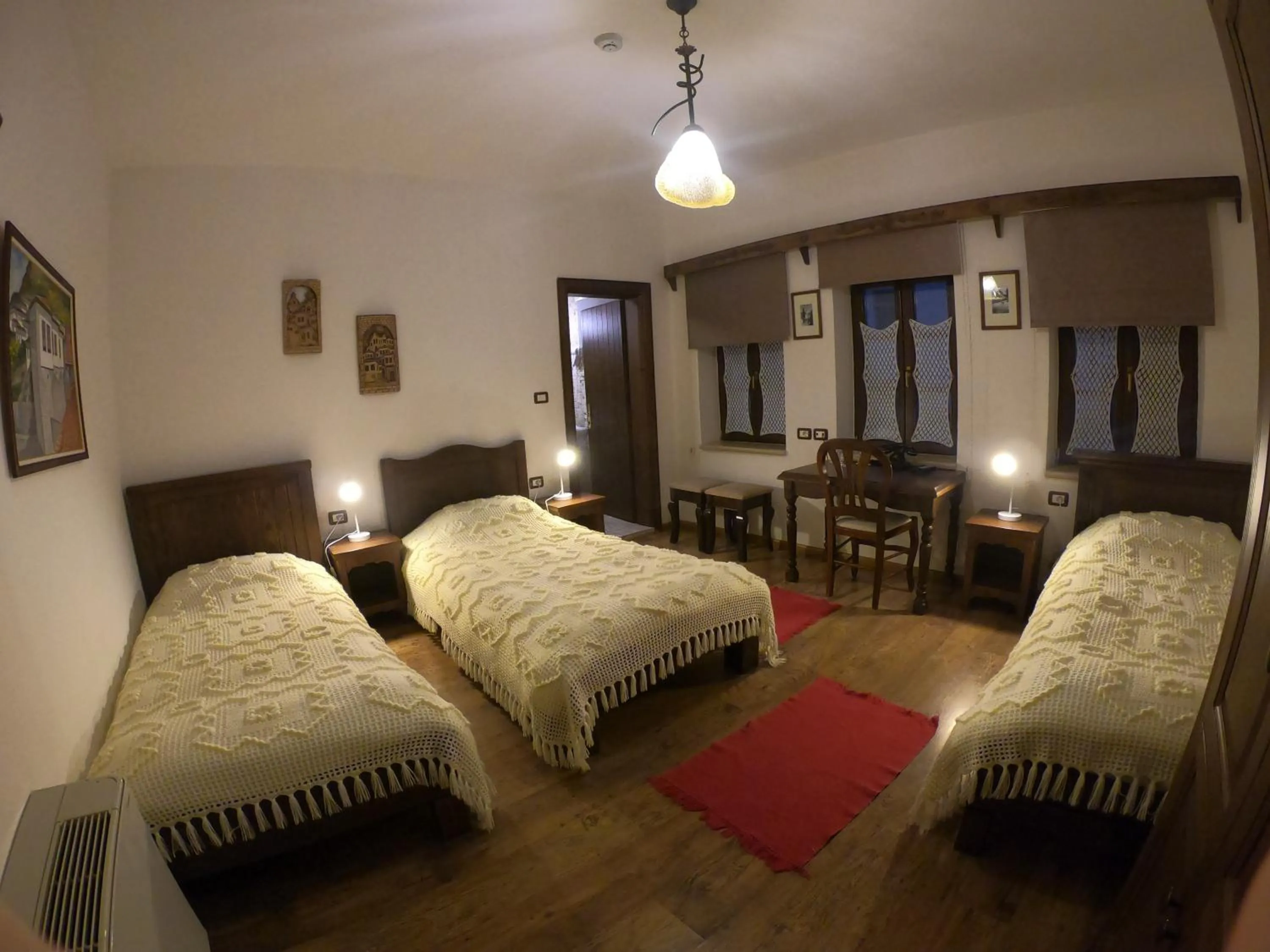 Bed in Hotel Mangalemi