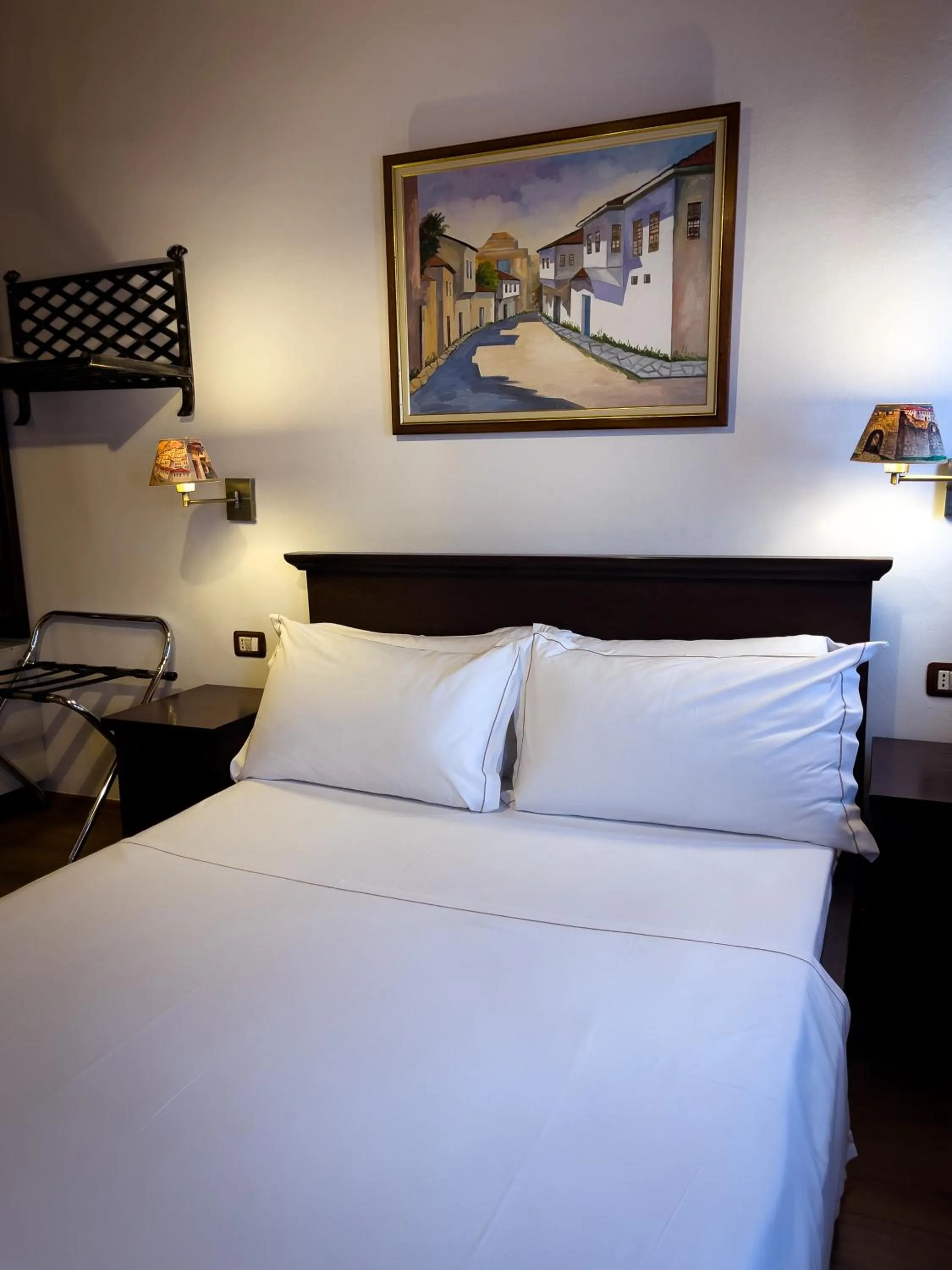 Bed in Hotel Mangalemi